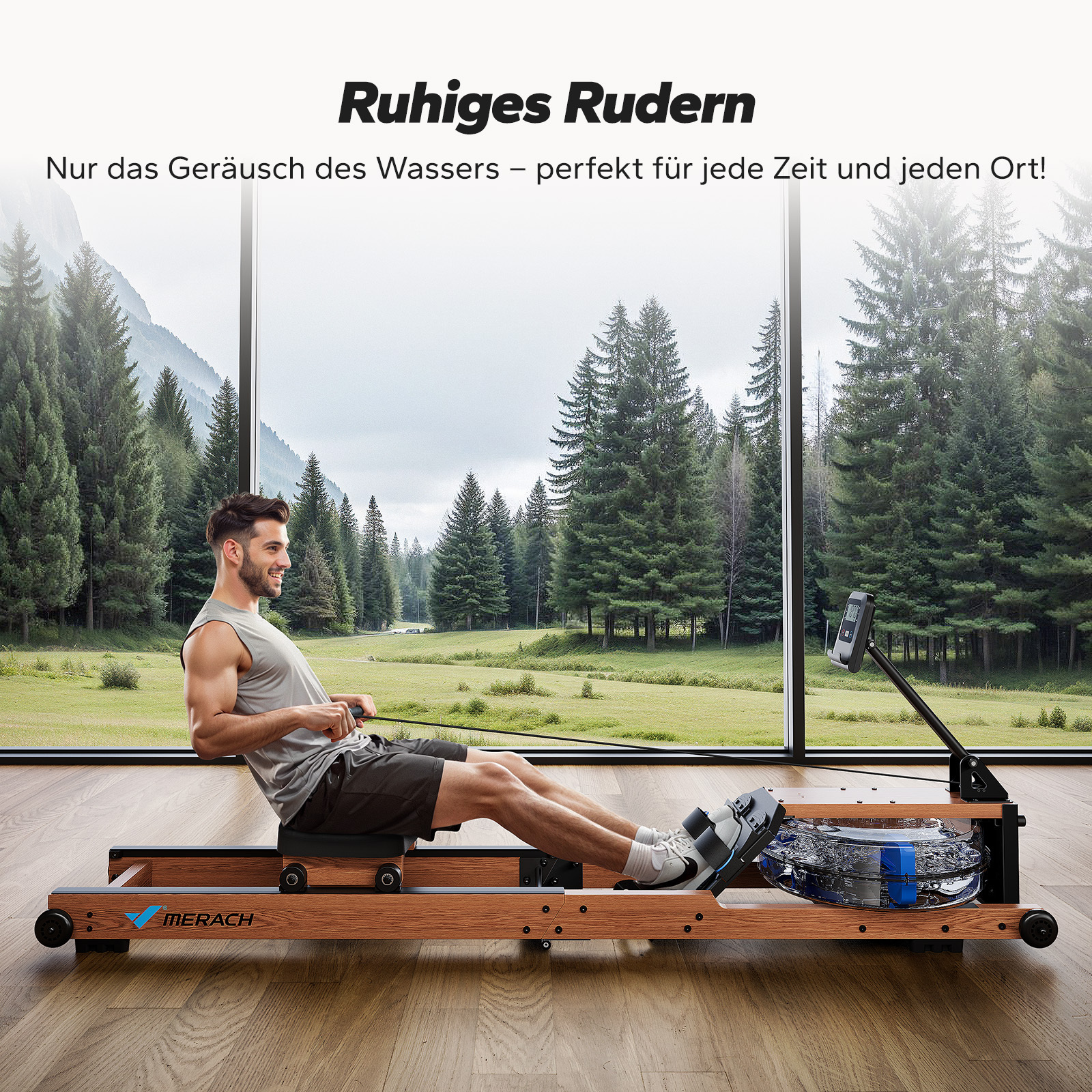 Mann auf Rudergerät vor Panoramafenster mit Wald und Bergen.