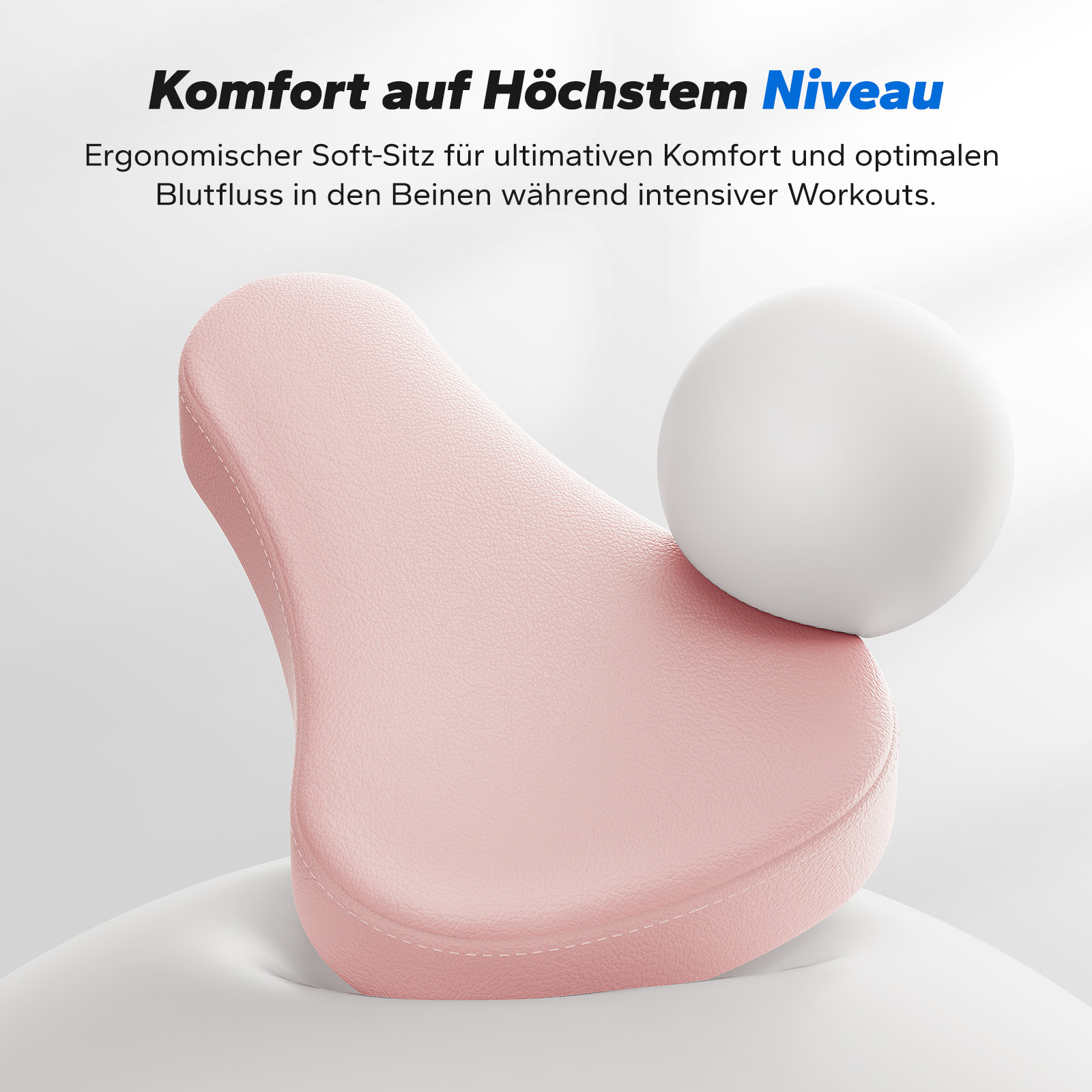Ein rosafarbener ergonomischer Fahrradsitz mit weißer Kugel.