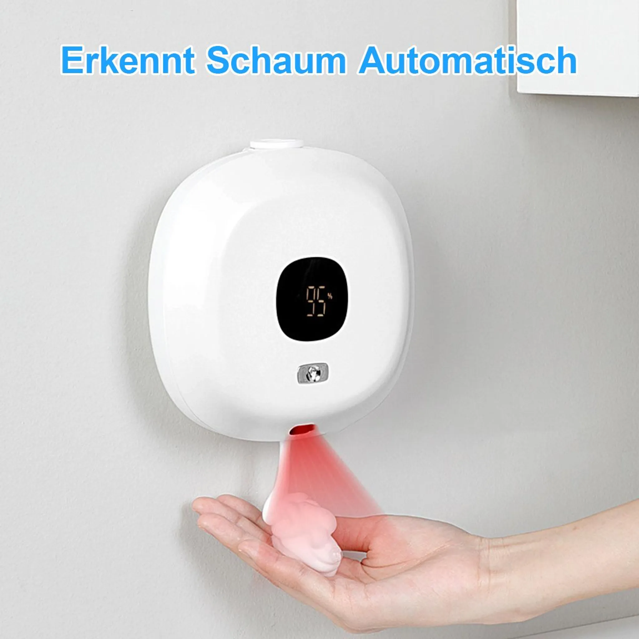 Ein weißer Schaumspender gibt Schaum in eine Hand.