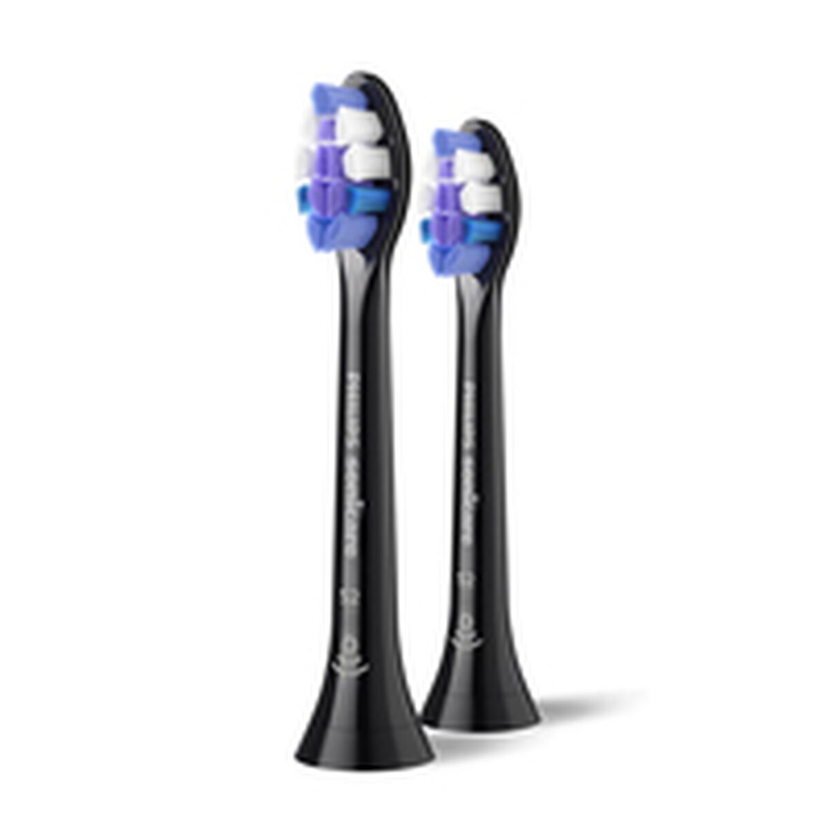 Due testine di spazzolino nere con setole blu, bianche e viola.