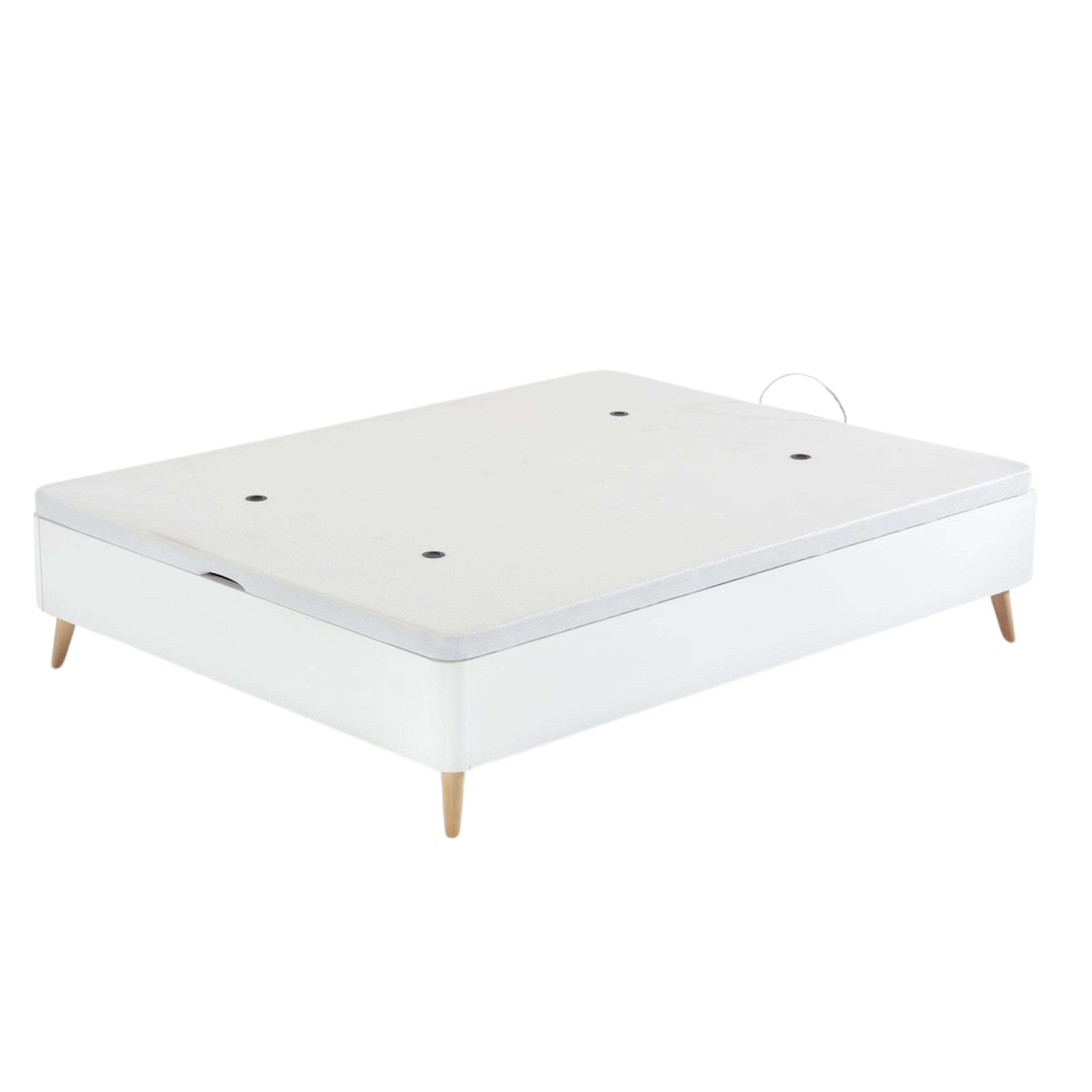 Un somier blanco con cuatro patas de madera y un colchón gris.