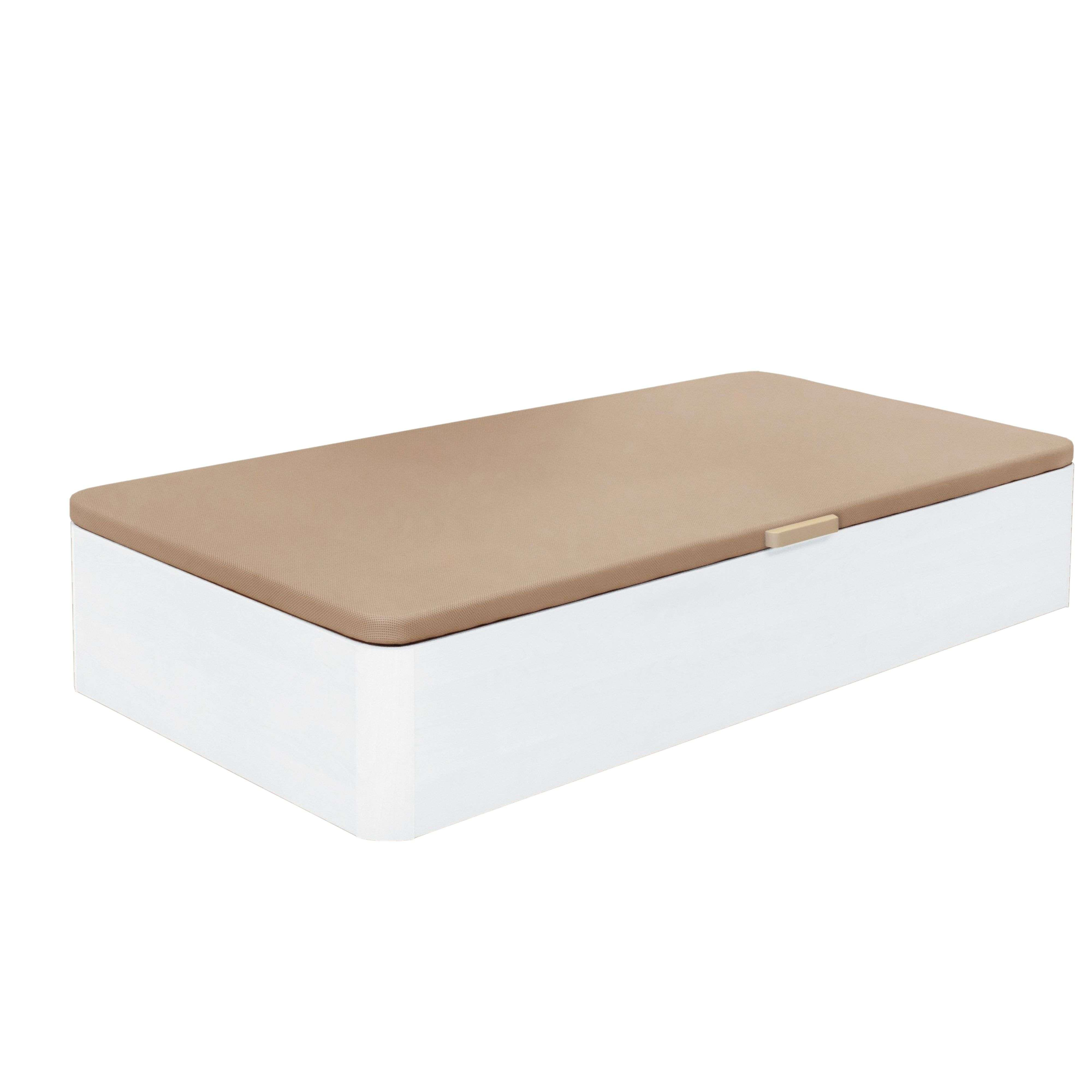 Una base de cama blanca con un cubrecolchón acolchado marrón claro.