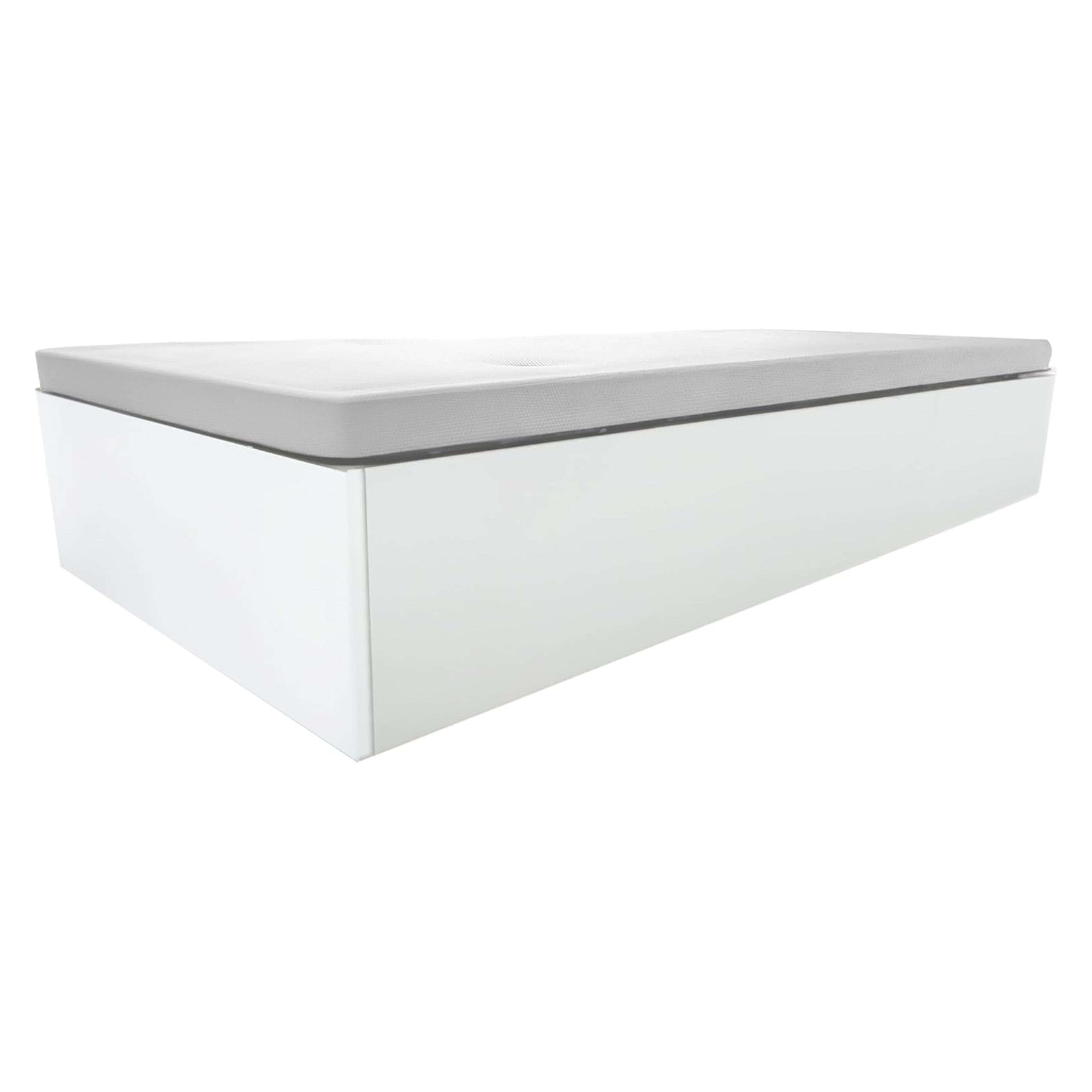 Un objeto blanco con tapa gris, parecido a un banco bajo, aislado en blanco.