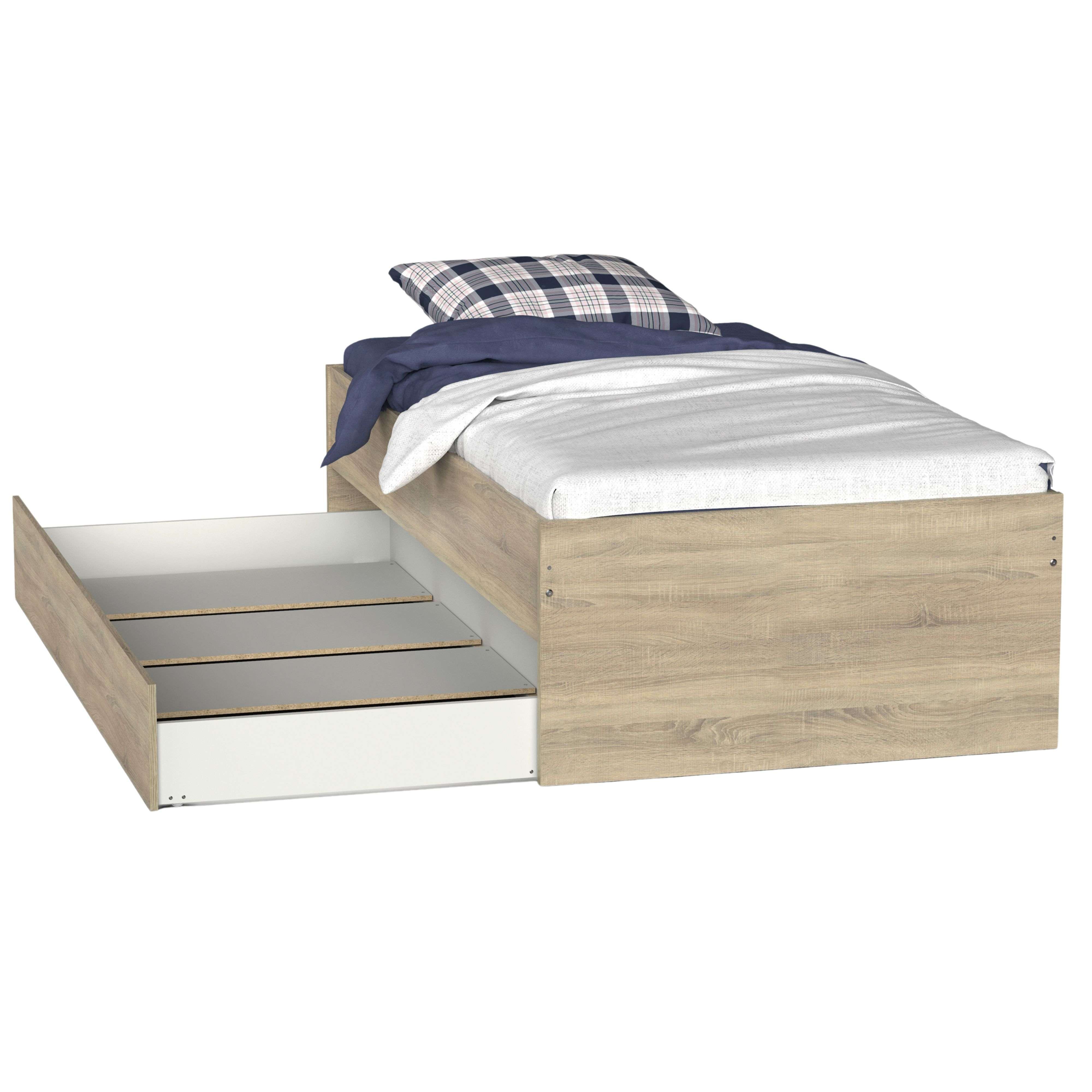 Una cama individual con cajón extraíble y ropa de cama a cuadros.