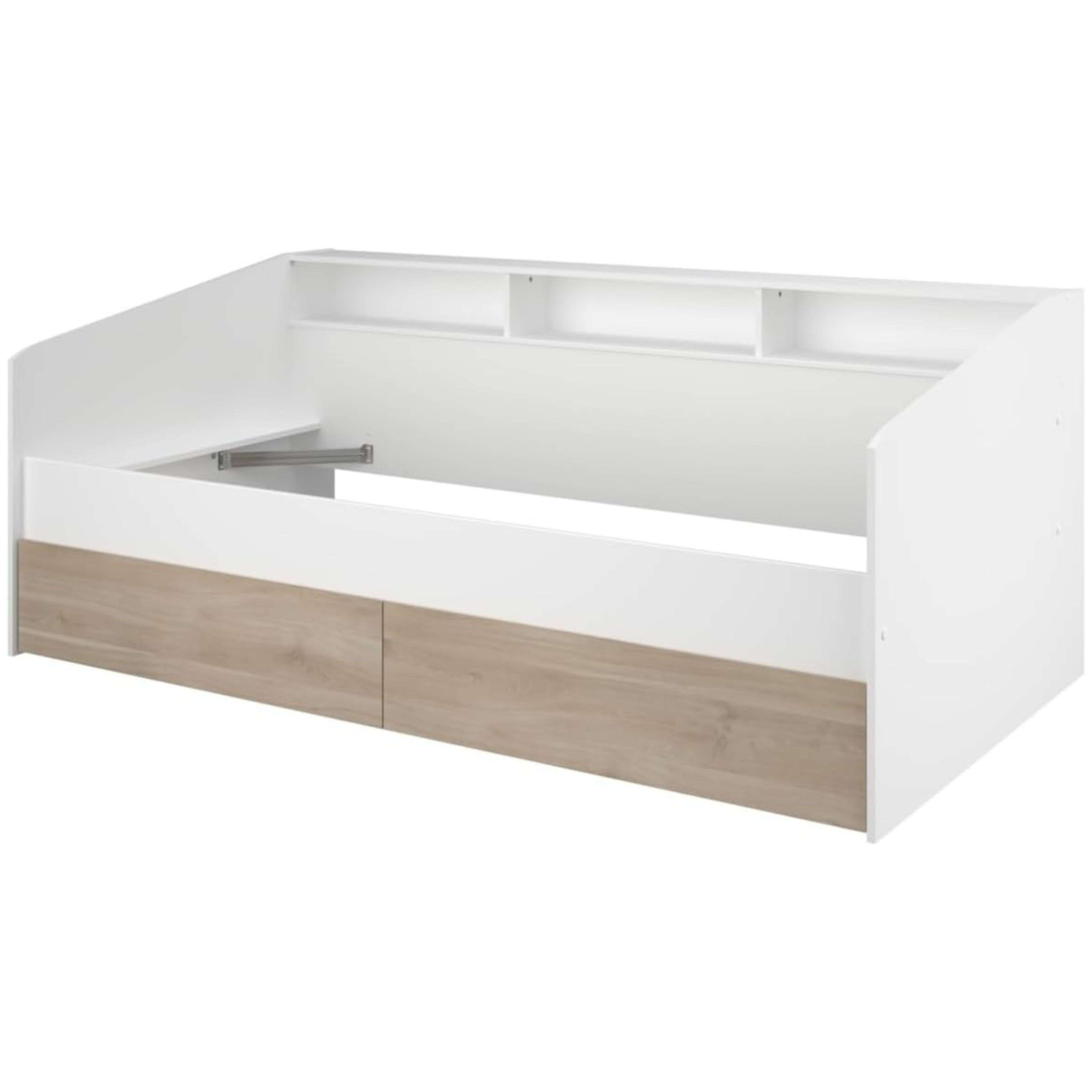 Una estructura de cama blanca con cajones de madera y estantes abiertos.