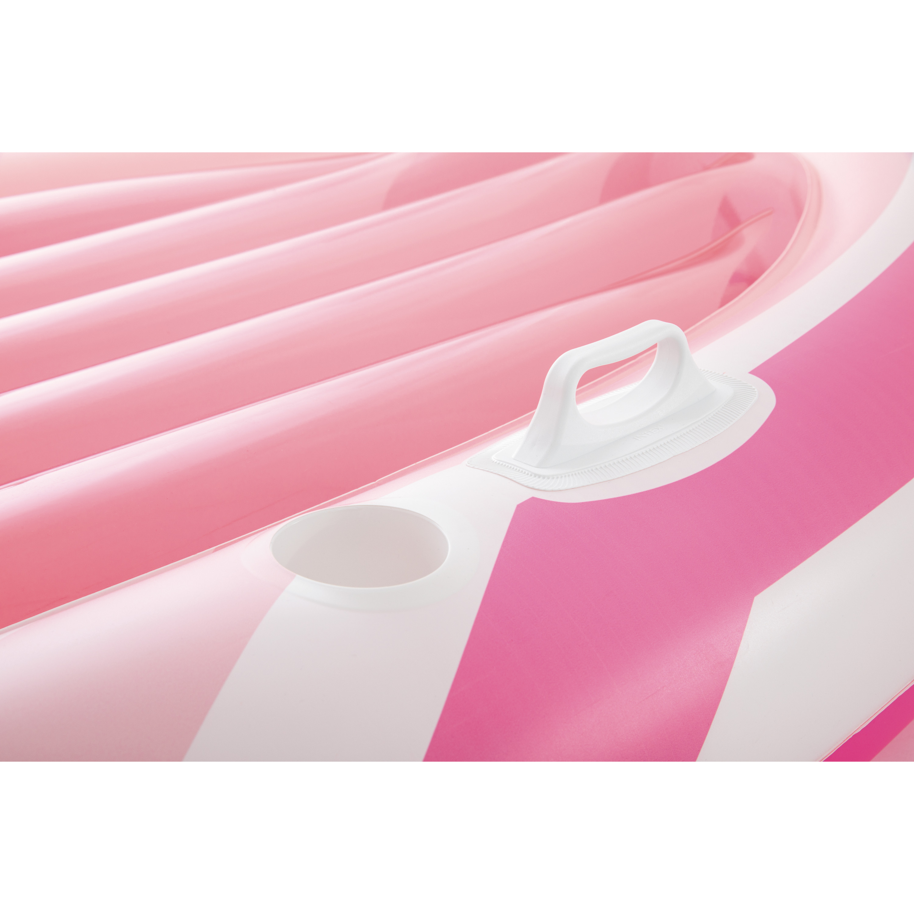 Aufblasbare pink-weiße Luftmatratze mit Griff und Getränkehalter.