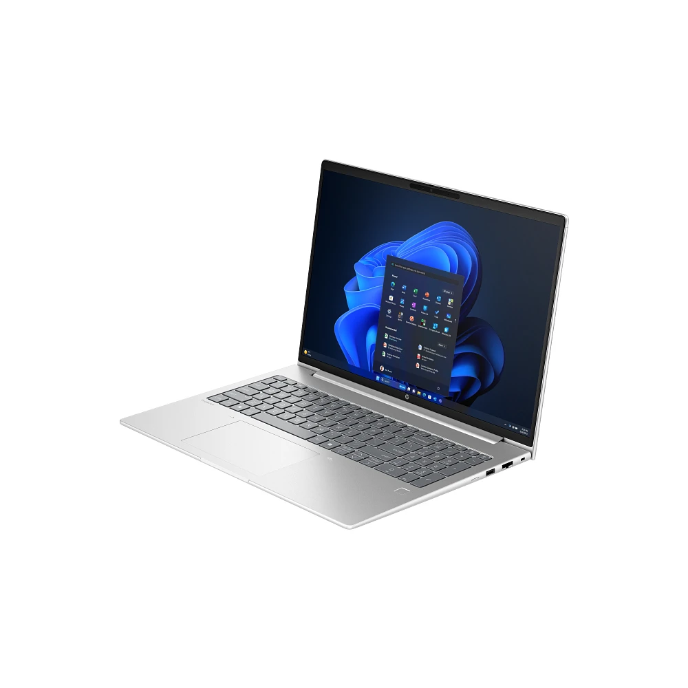 Mavi duvar kağıtlı Windows 11'i gösteren açık ekranlı gümüş rengi bir dizüstü bilgisayar.