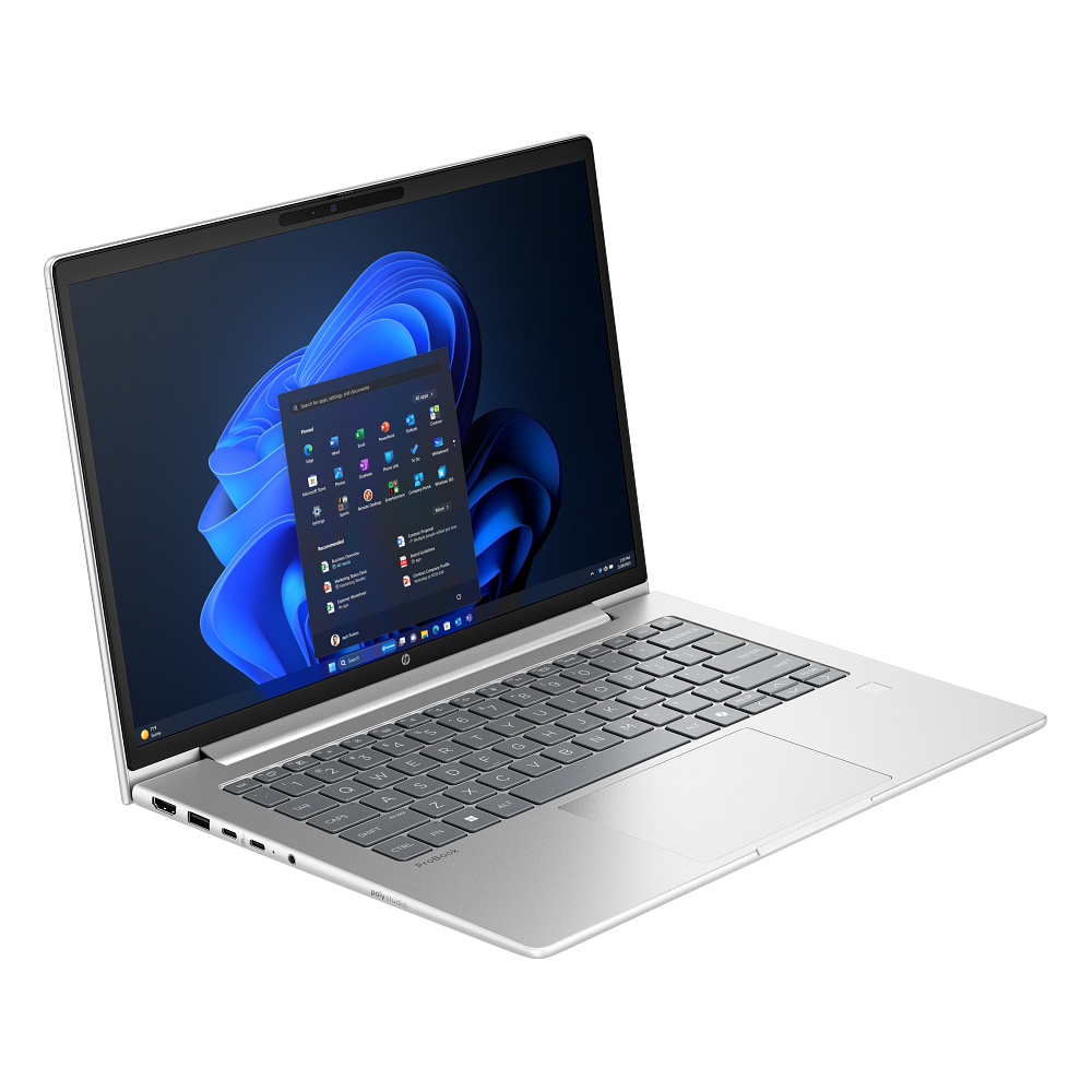 Windows 11 gösteren açık ekranlı gümüş rengi dizüstü bilgisayar.