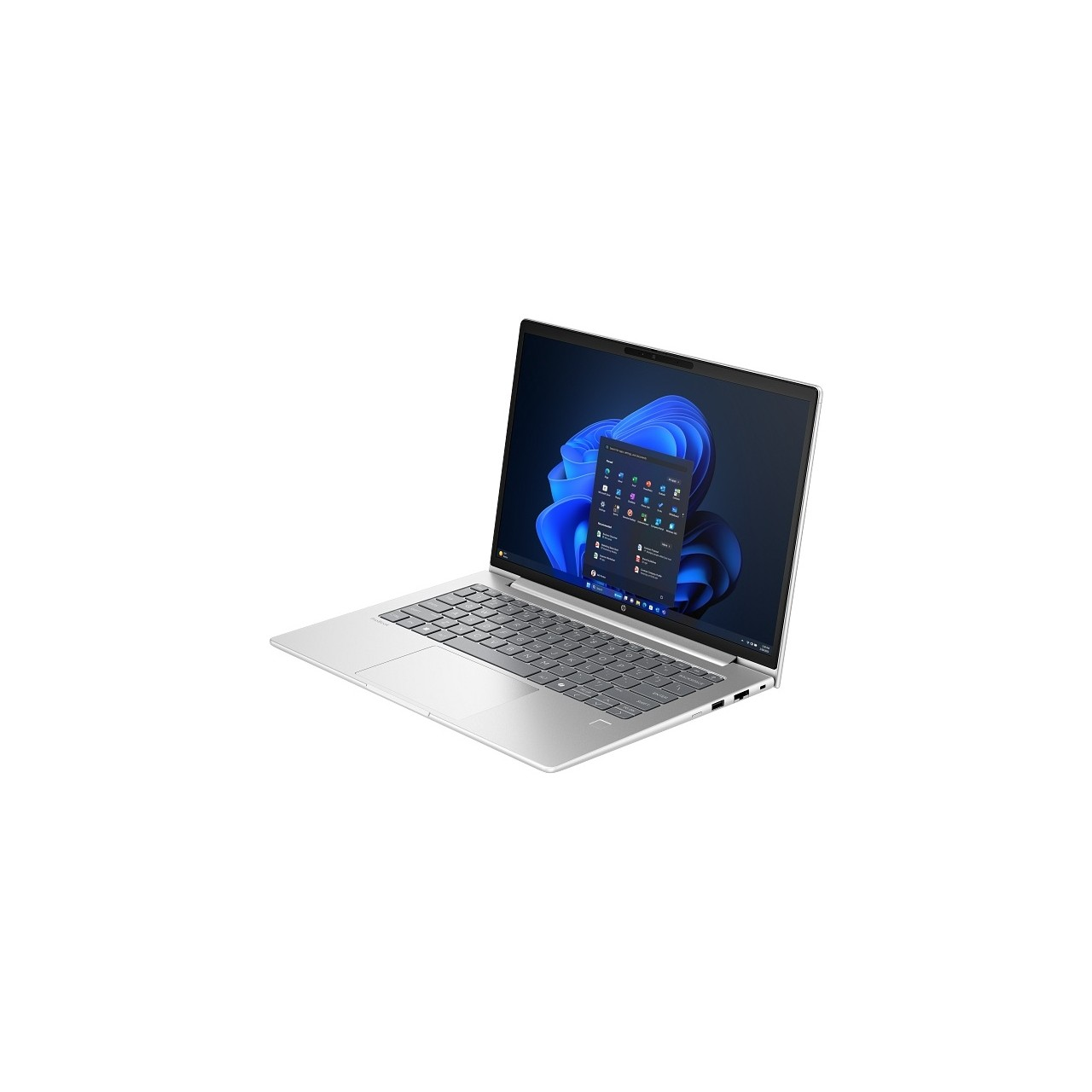 Windows 11 başlangıç menüsünü gösteren açık ekranlı gümüş rengi bir dizüstü bilgisayar.