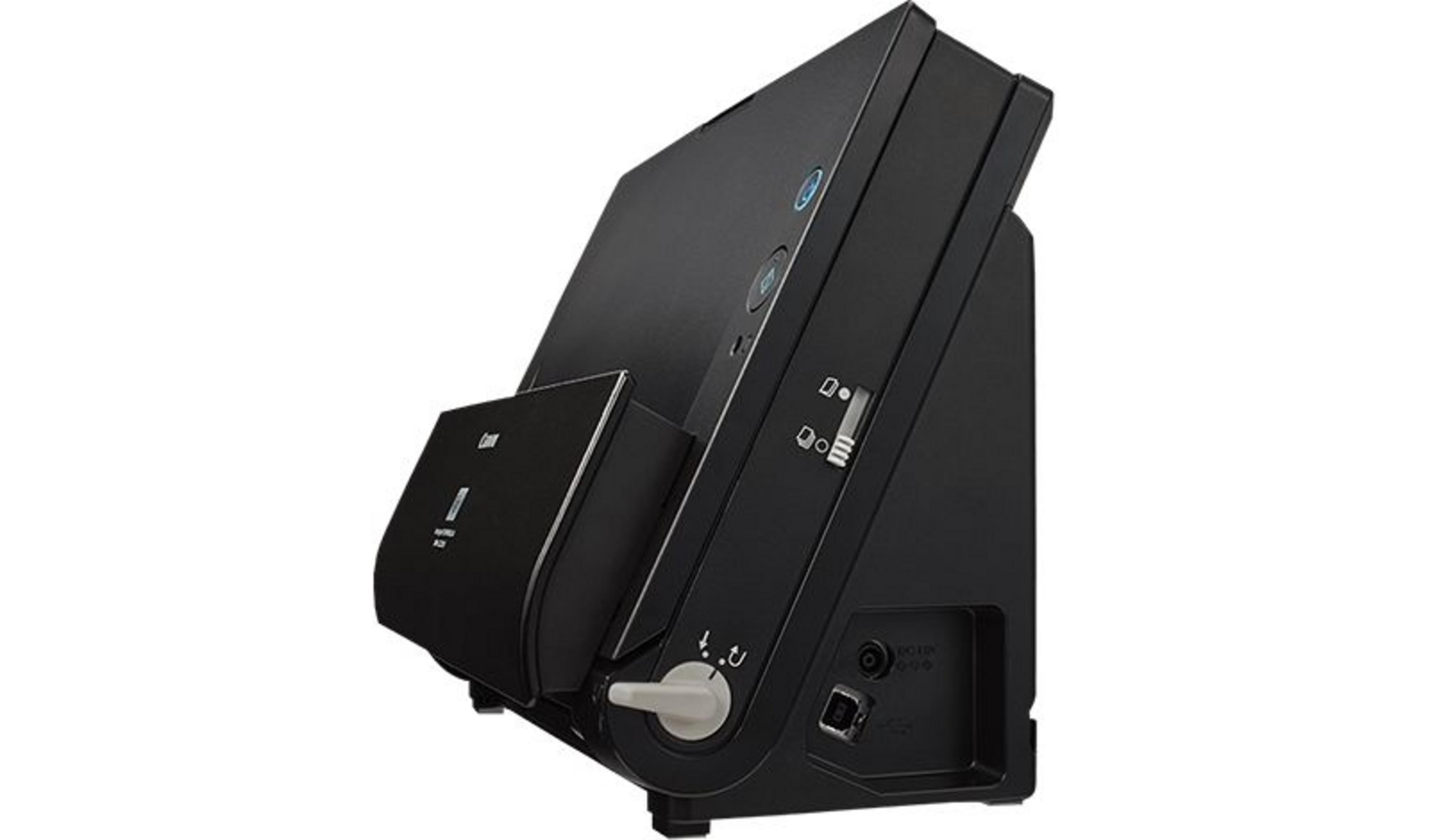 Ein schwarzer Scanner mit Anschlüssen an der Seite.