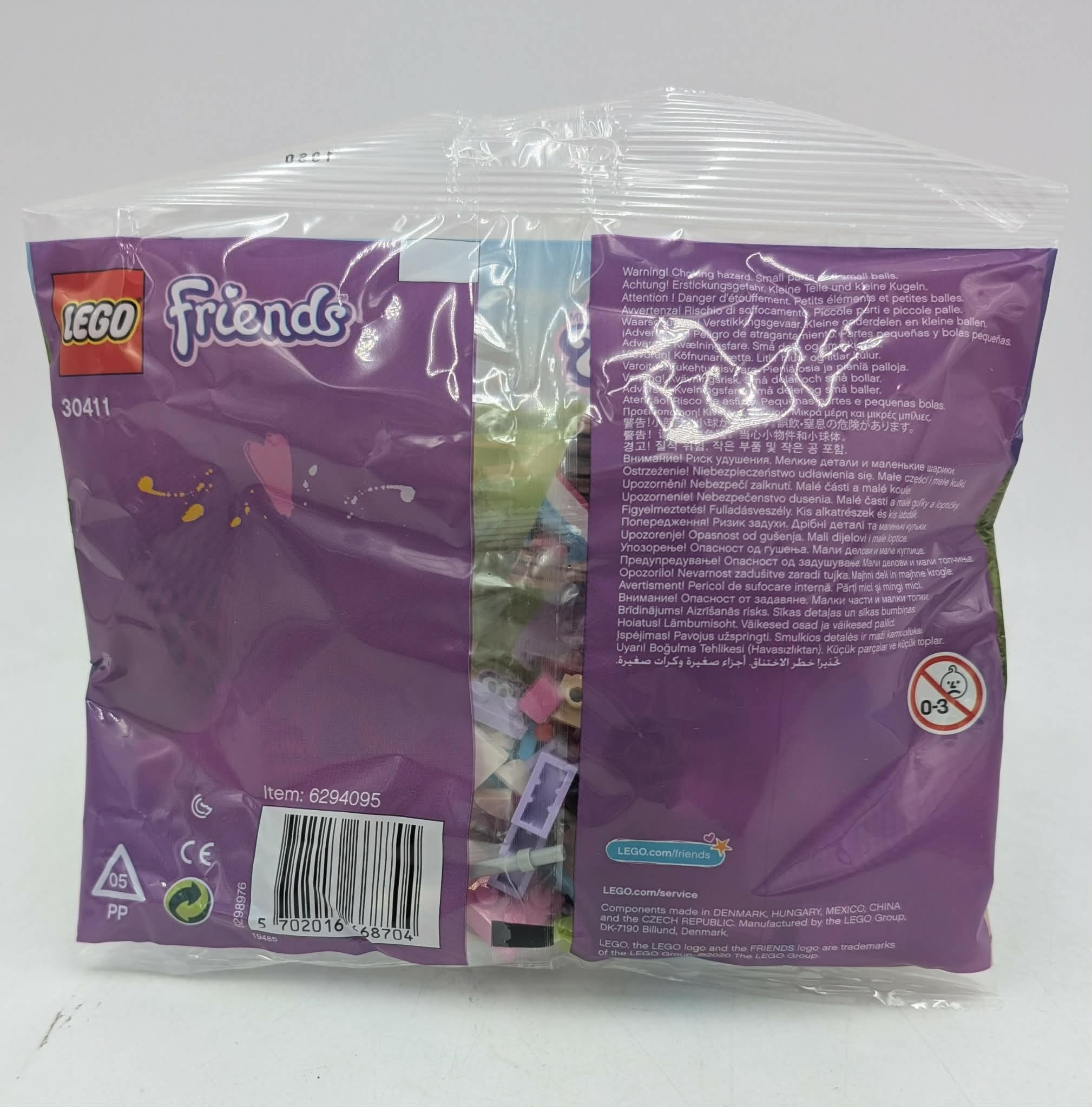 Uyarı etiketli LEGO Friends yapı taşı ambalajı.