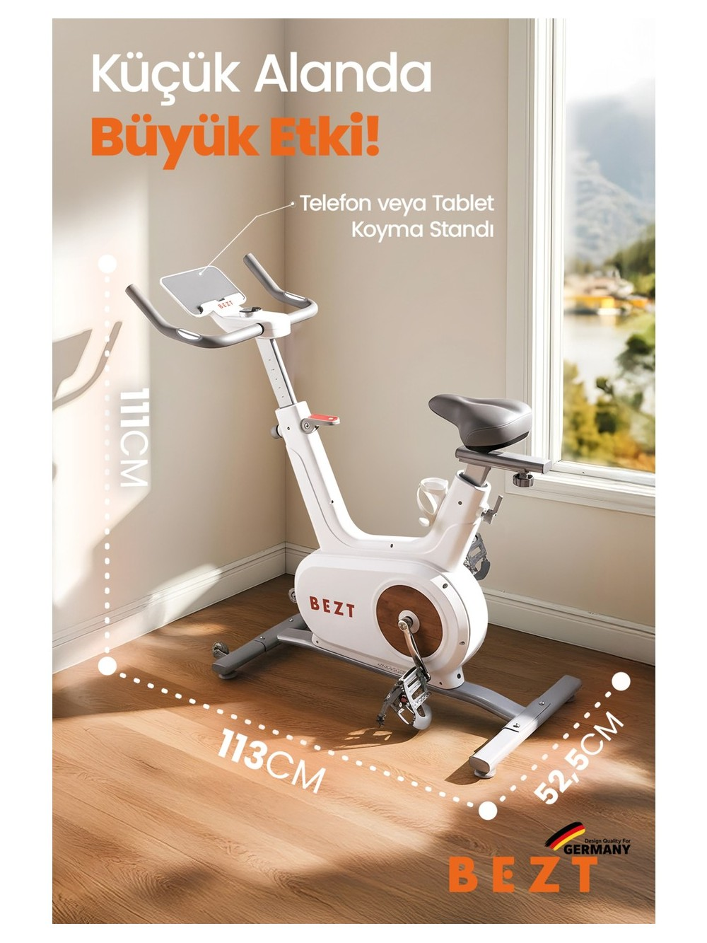 Pencere önünde telefon/tablet tutuculu beyaz egzersiz bisikleti.