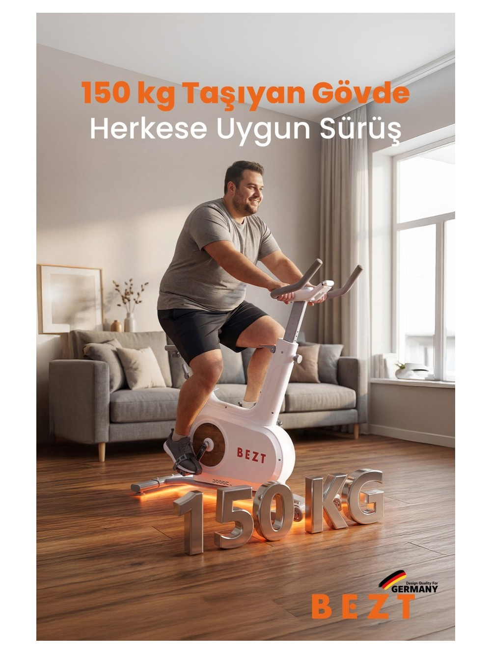 Bir adam oturma odasında beyaz bir egzersiz bisikleti sürüyor. 150 kg kapasite.