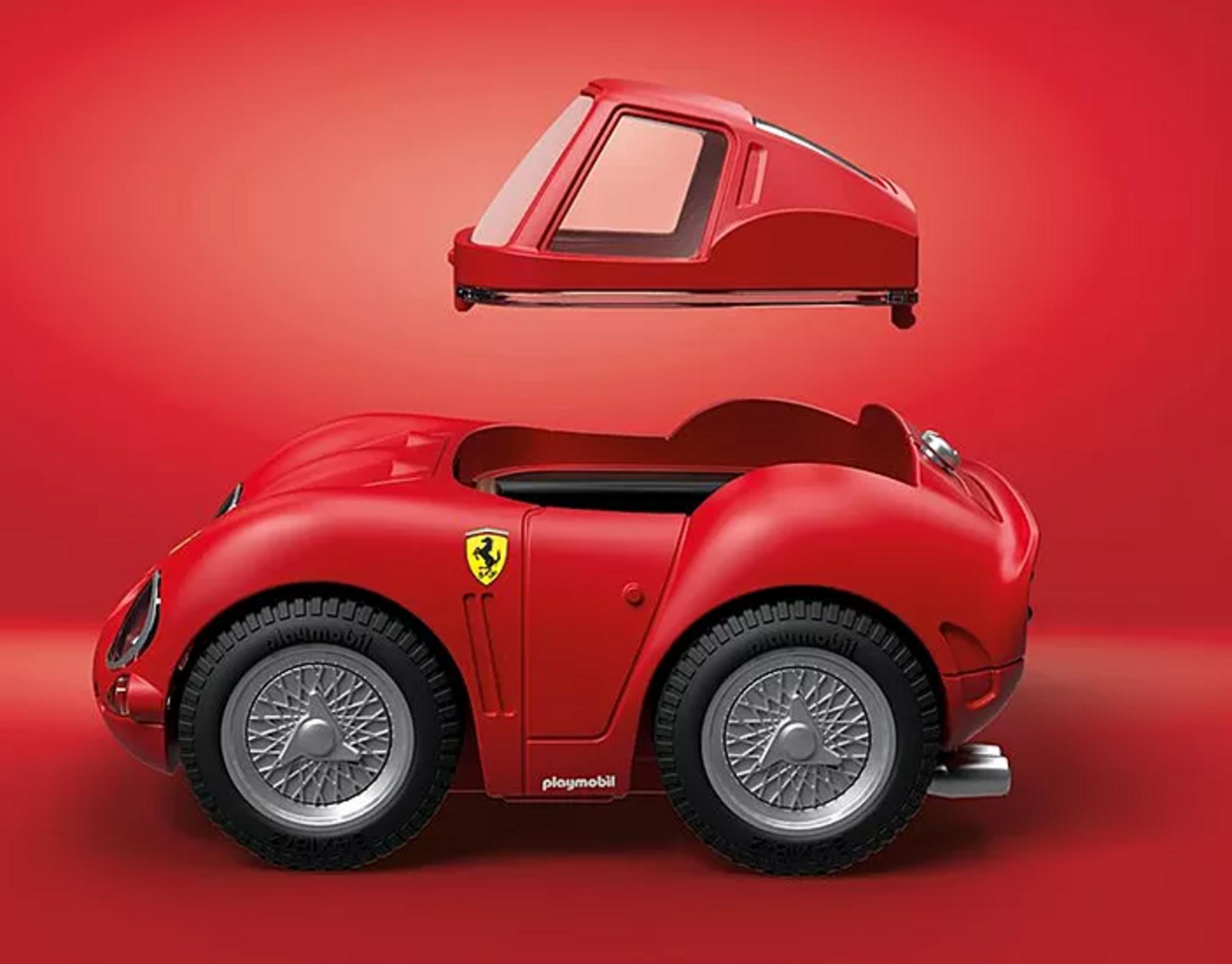 Çıkarılabilir tavanlı ve Ferrari logolu kırmızı oyuncak araba.