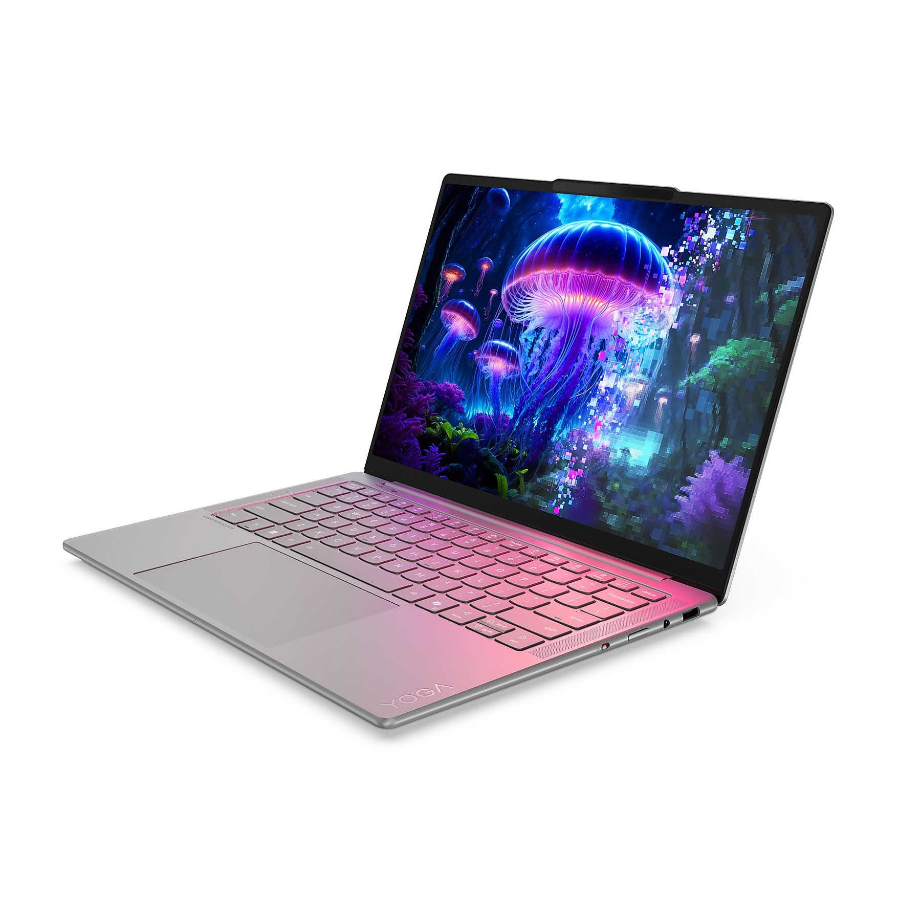 Un laptop argento-rosa che visualizza uno sfondo vivido di meduse sullo schermo.