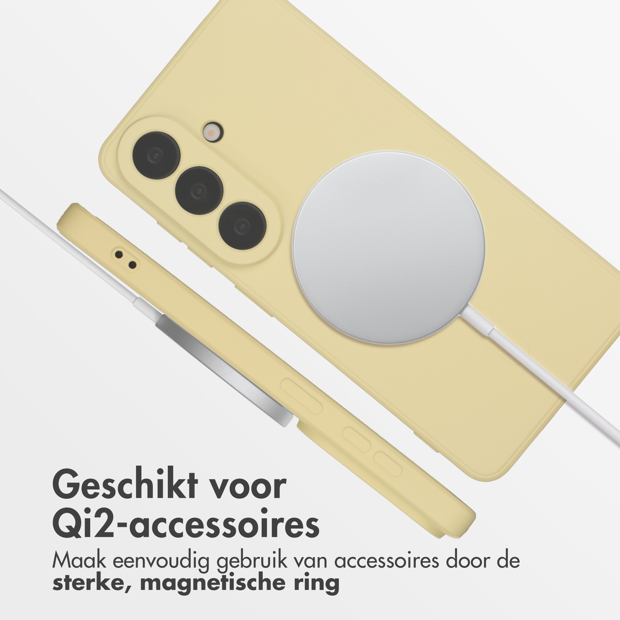 Un téléphone jaune avec un chargeur magnétique et un câble.