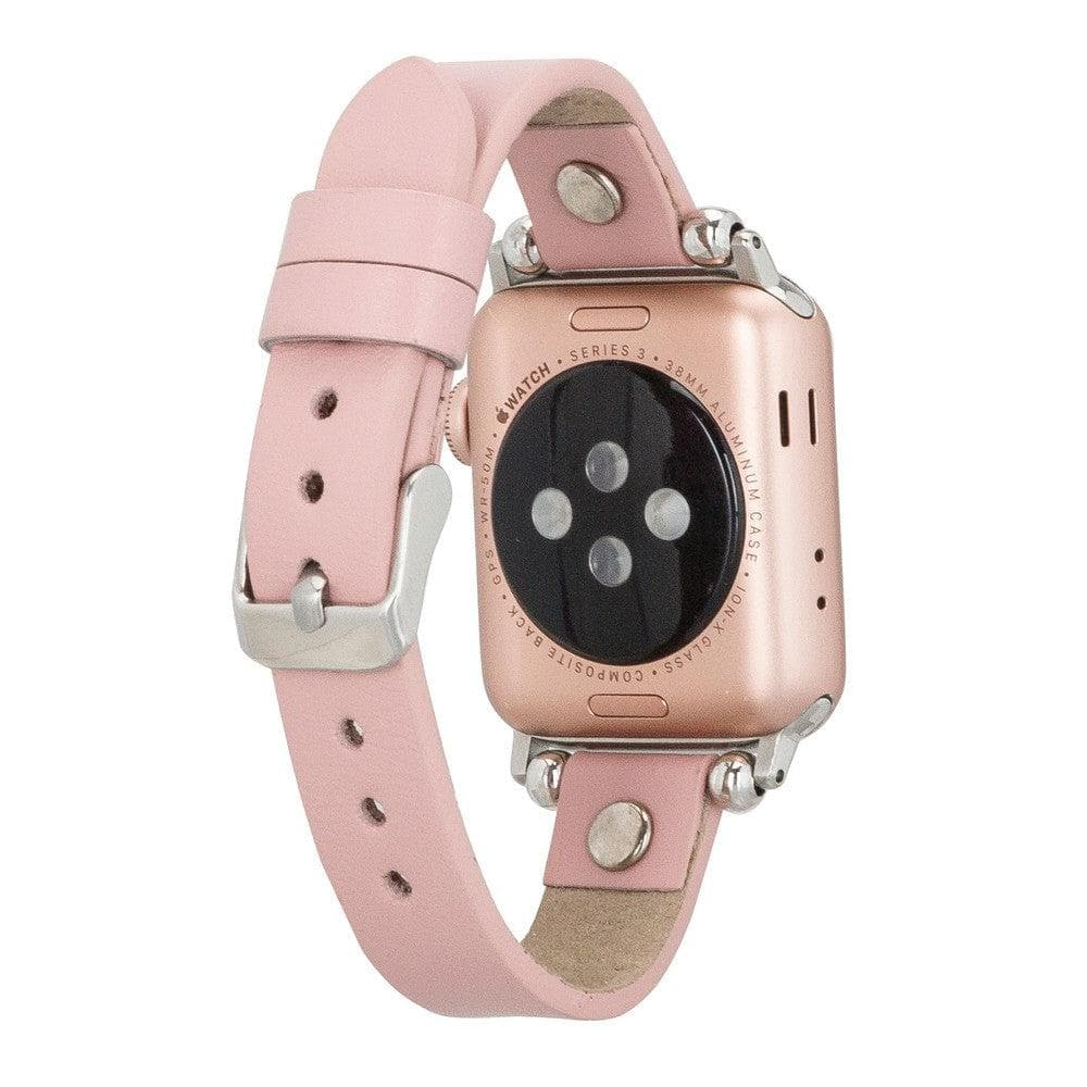 Pembe deri kordonlu pembe Apple Watch Series 3, yakın çekim.
