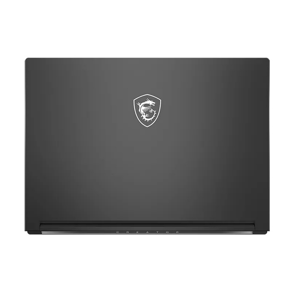 Un laptop MSI Creator grigio scuro chiuso con logo di drago bianco sul coperchio.