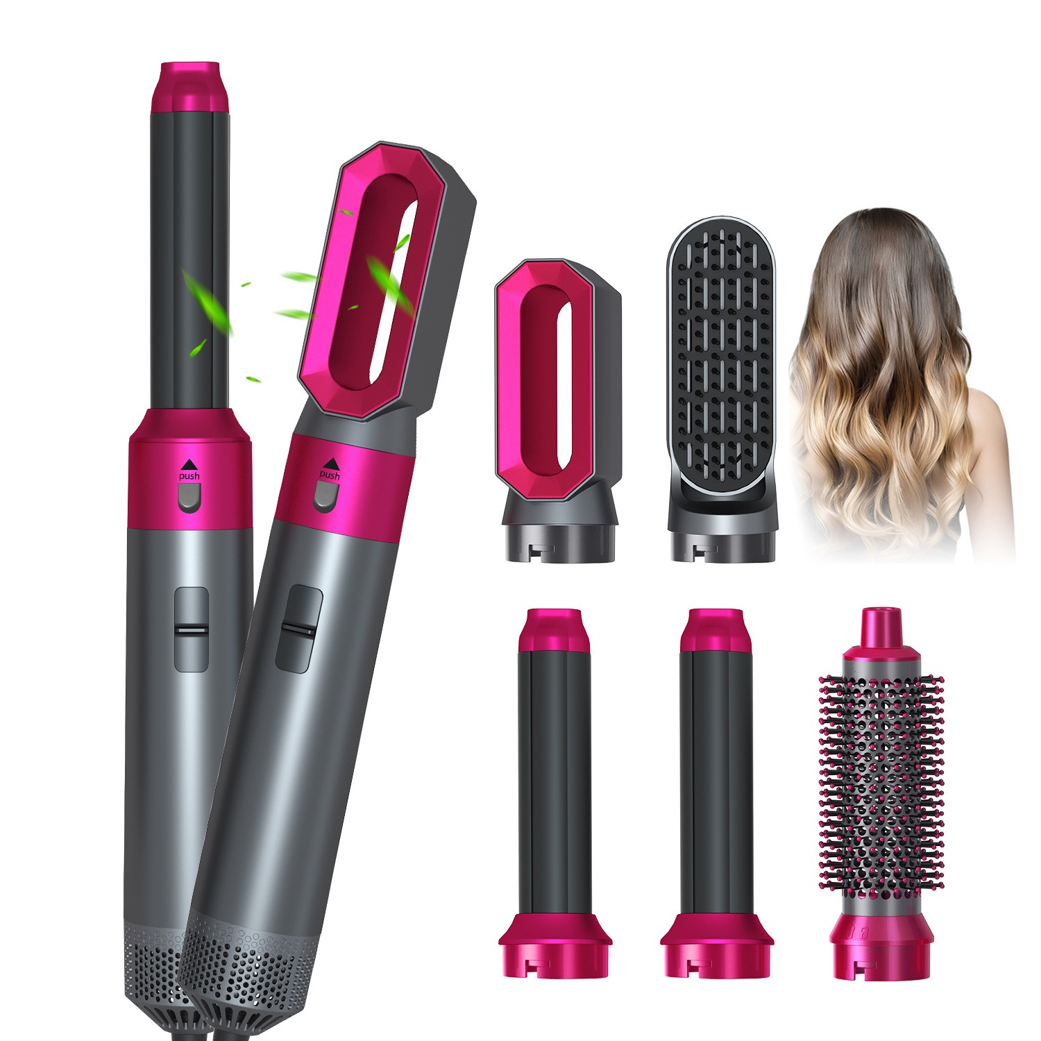 Ein Haartrockner-Set mit verschiedenen Aufsätzen in Grau und Pink.
