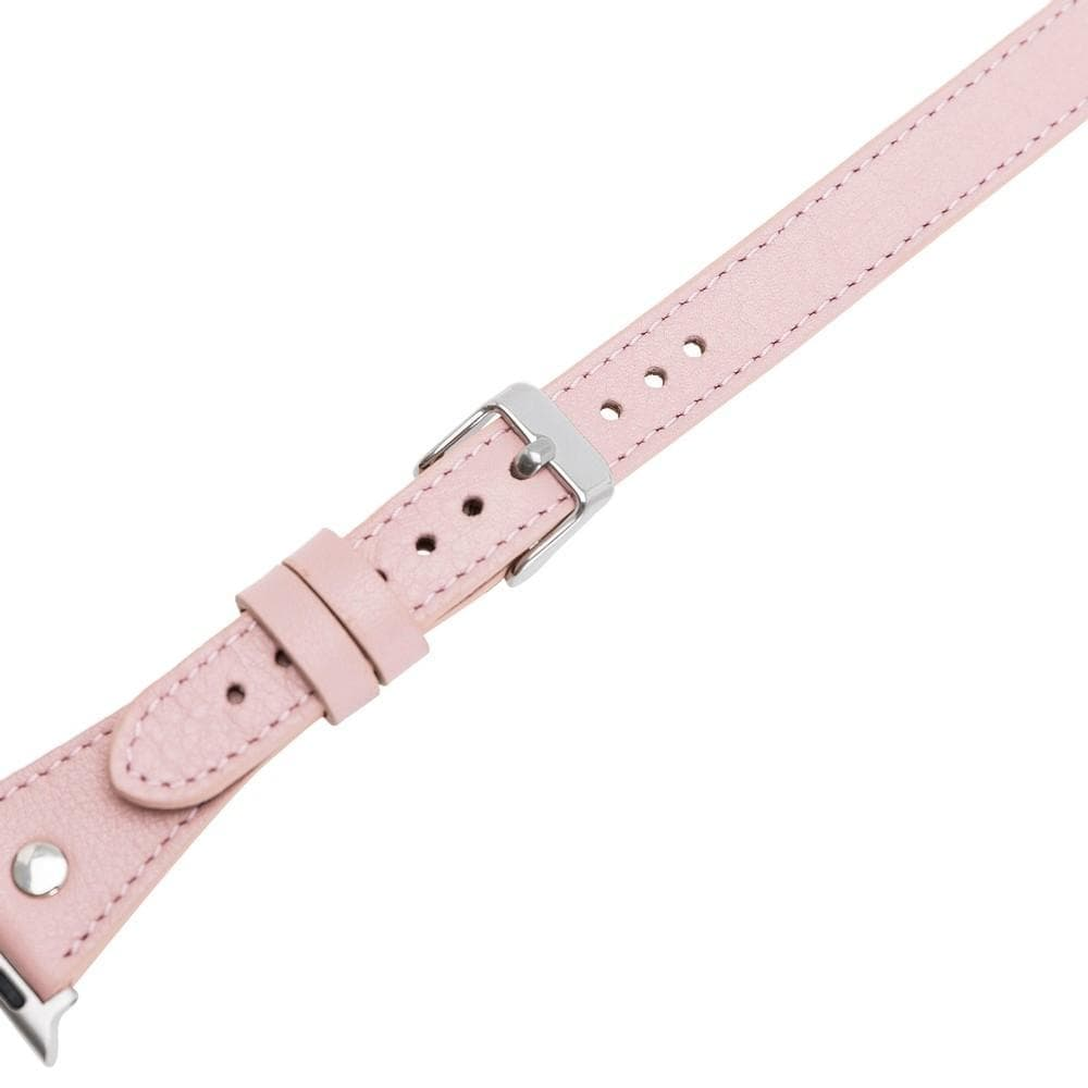 Gümüş tokalı, delikli, pembe deri saat kayışı.