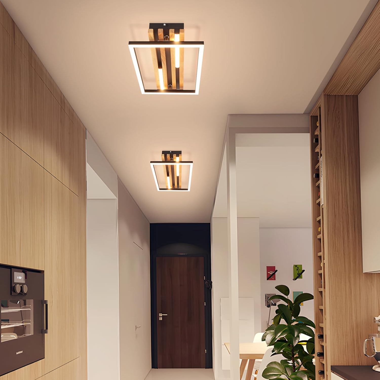 Corridoio con lampade moderne in legno e metallo, forno da incasso e pavimento in legno.