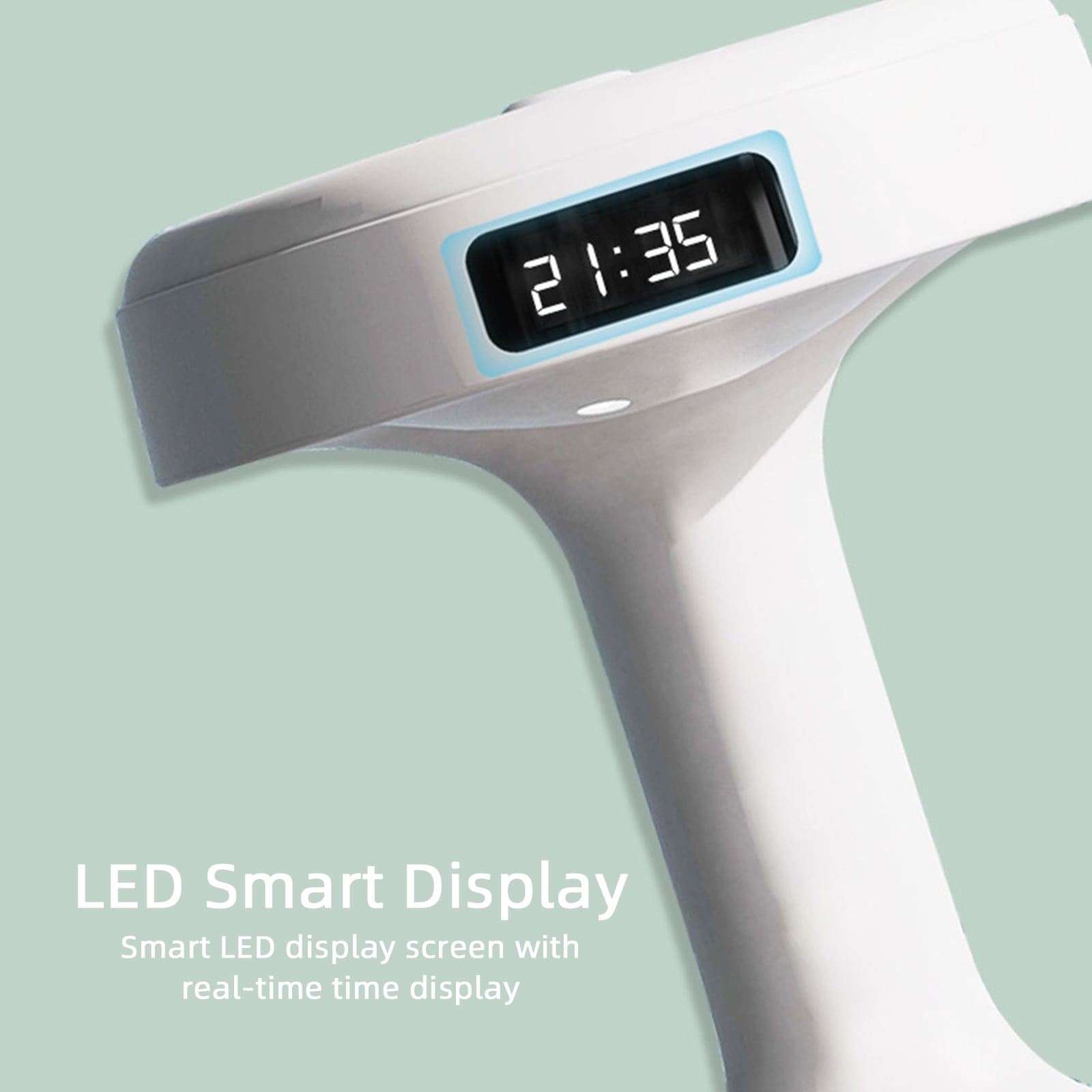 Ein weißes Gerät mit einem LED-Display, das 21:35 anzeigt.