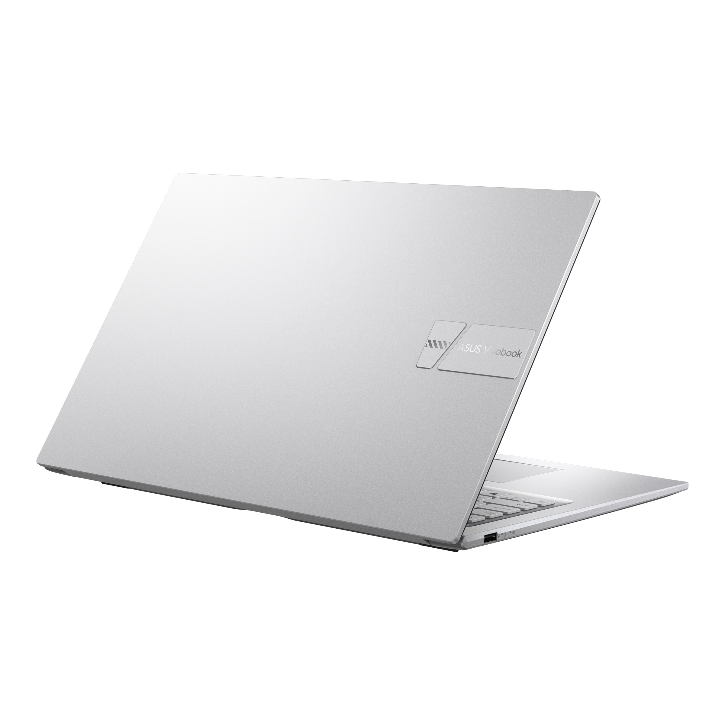 Un laptop Asus Vivobook argentato, mostrato da dietro e leggermente angolato dall'alto.