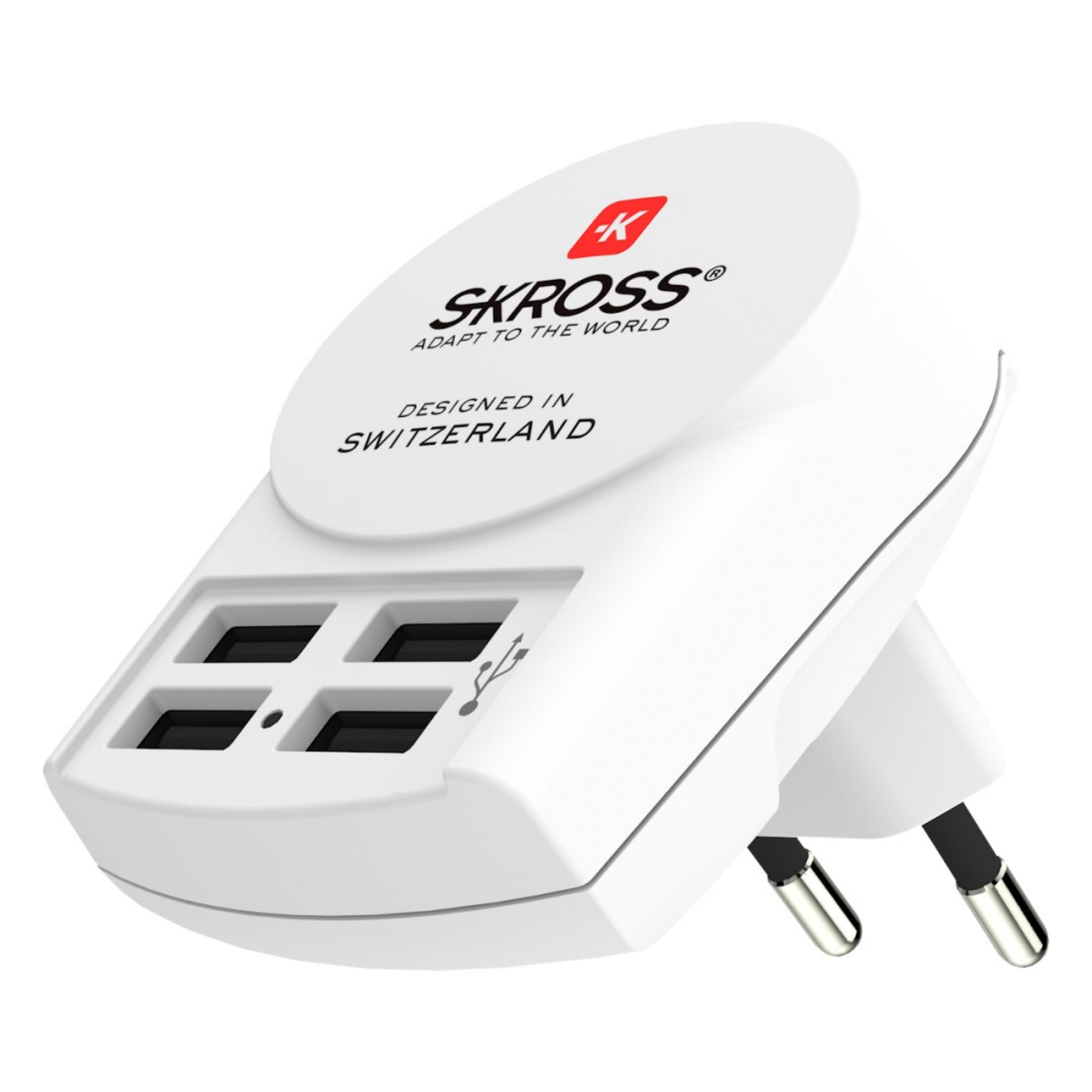 Adattatore da viaggio bianco con quattro porte USB e spina UK.
