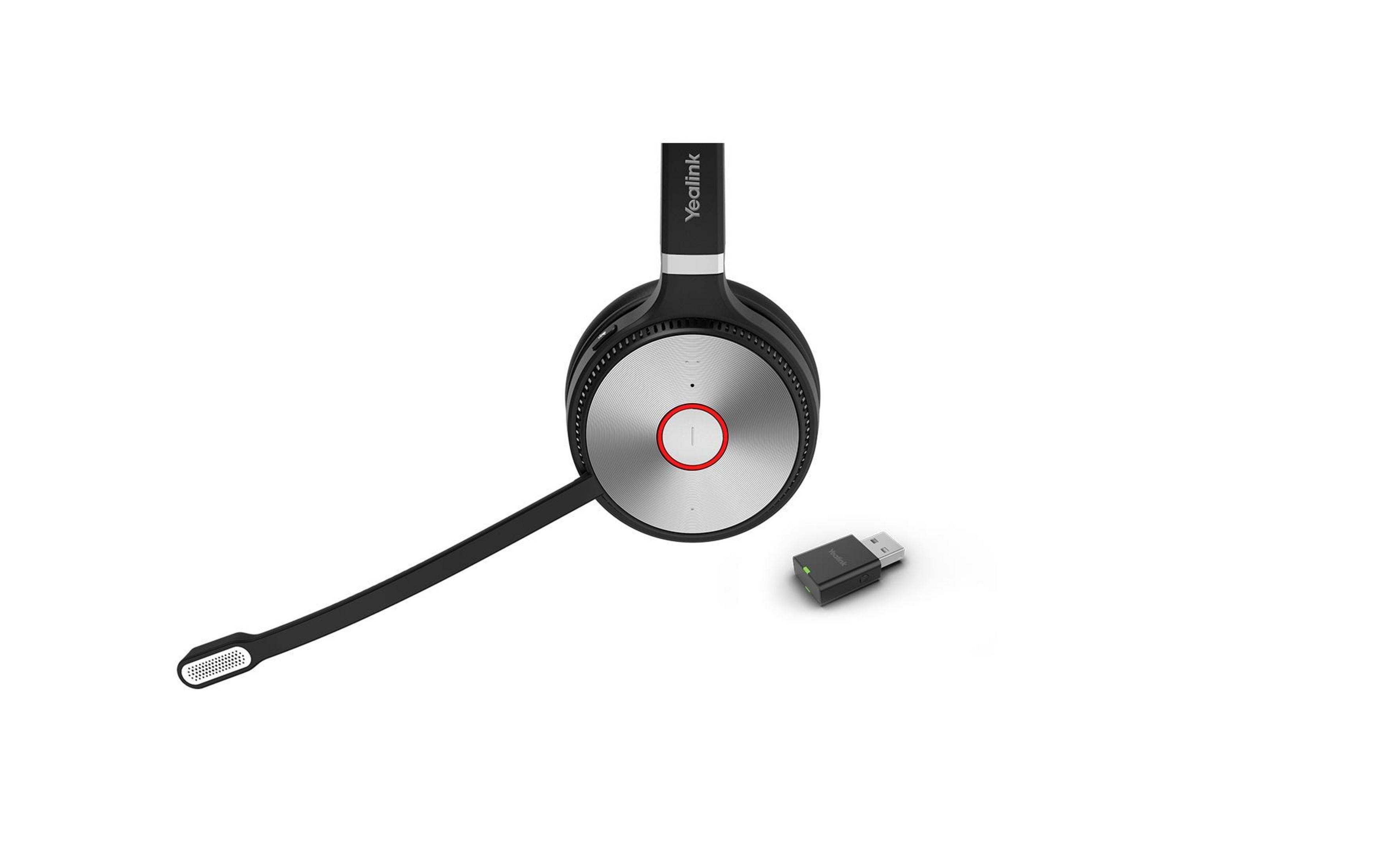 A black Yealink headset with a microphone and USB dongle on a white background.