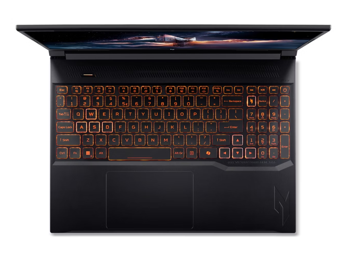 Un laptop nero aperto con tastiera illuminata e sfondo a tema spaziale.