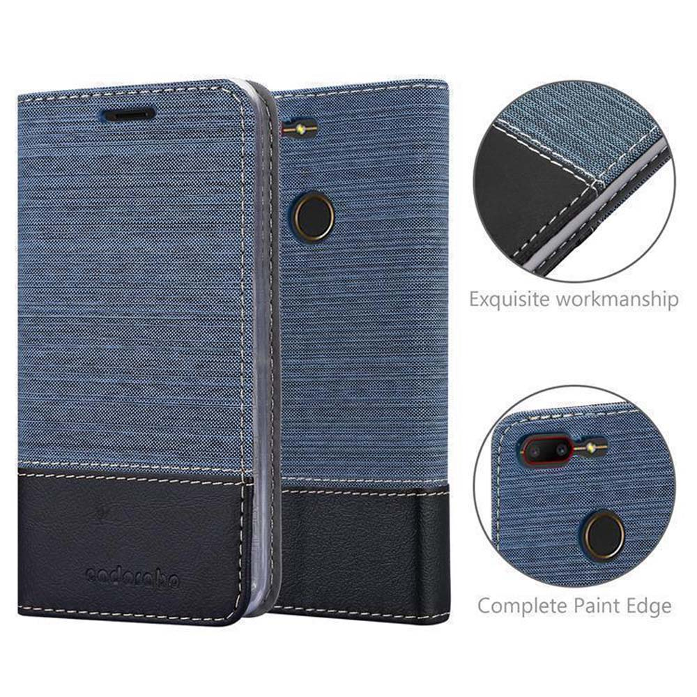 Custodia per telefono in tessuto blu con finiture in pelle nera e dettagli cuciti.