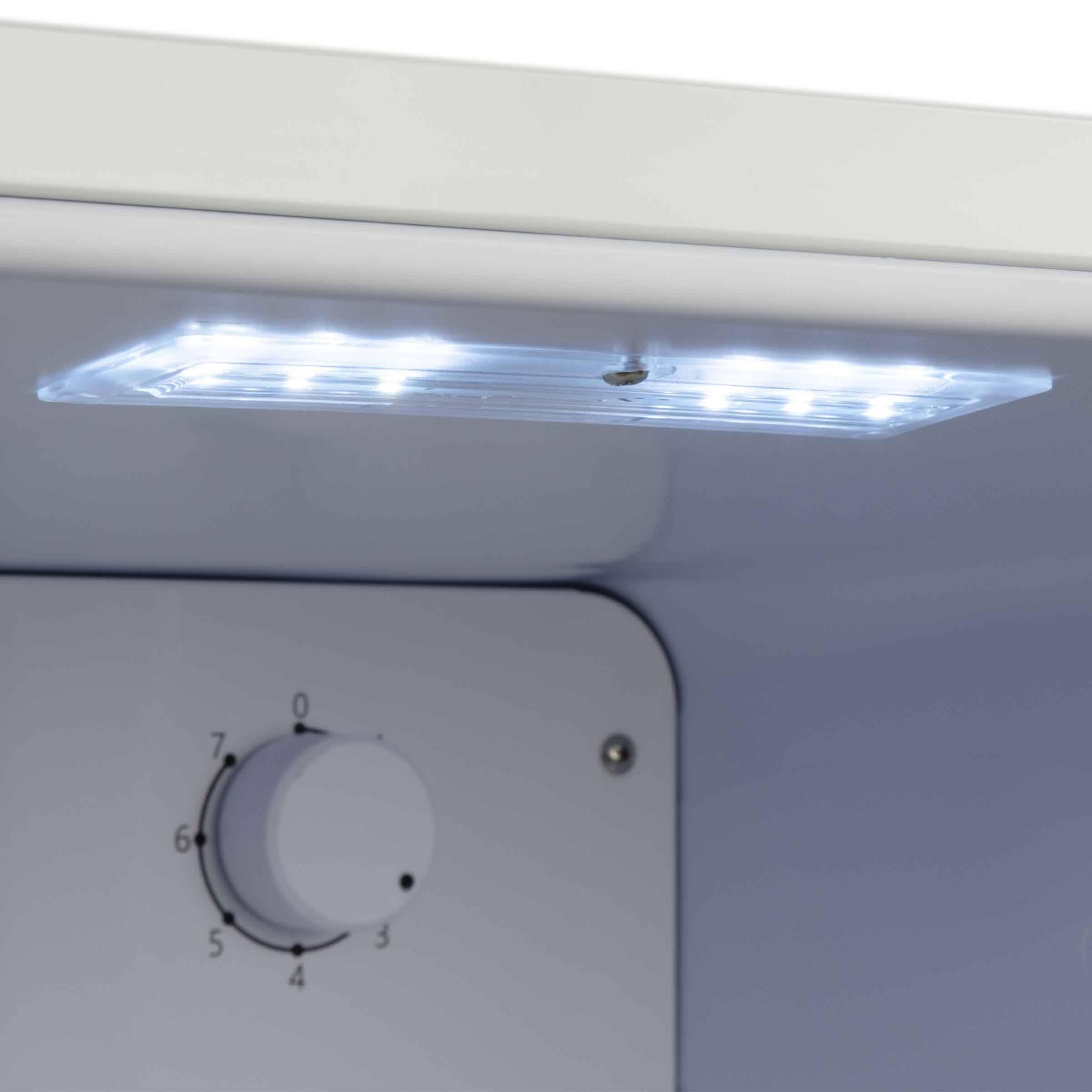 Een koelkastlamp met LED's verlicht een temperatuurregelaar.