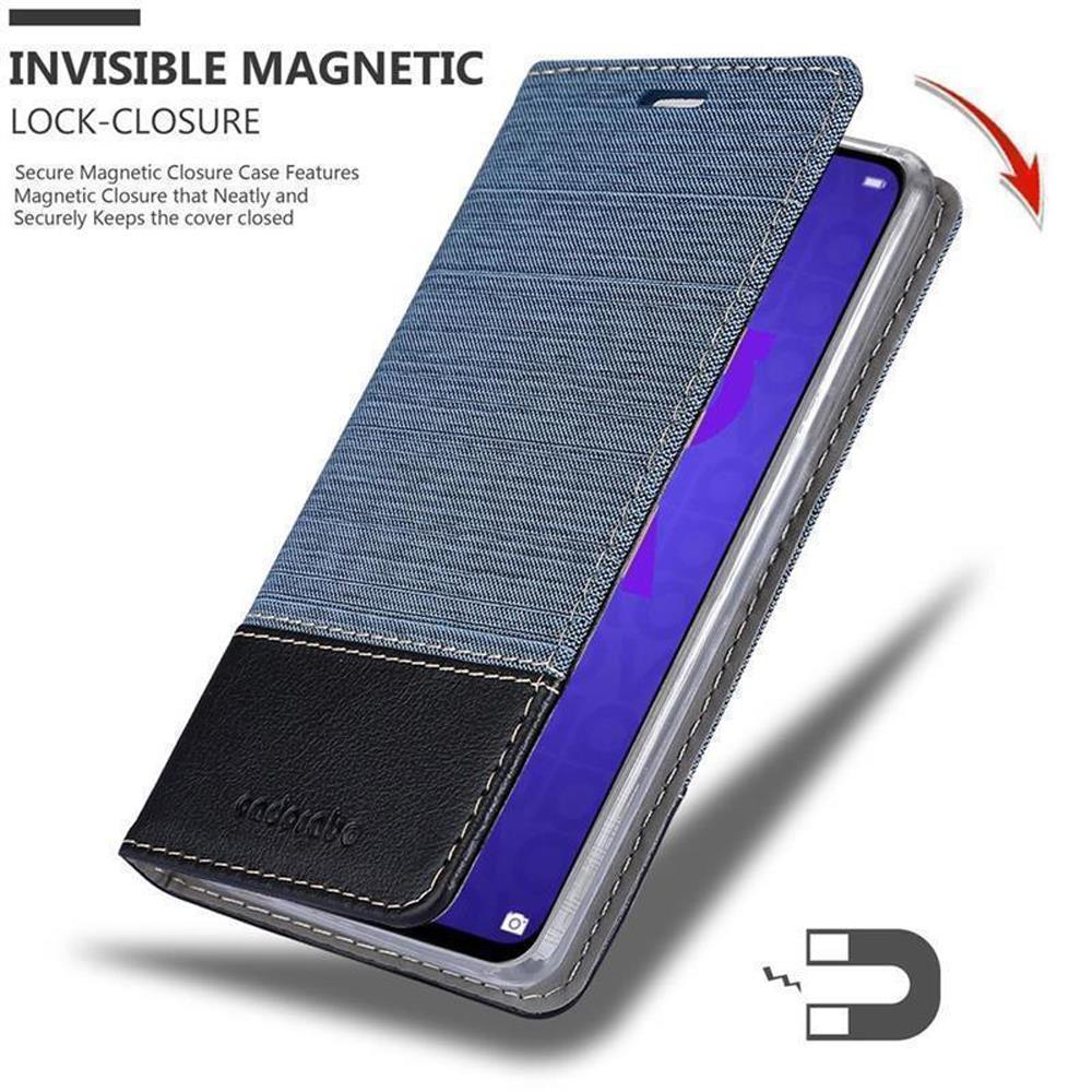 Custodia per telefono in denim blu con accento in pelle nera, magnetica.