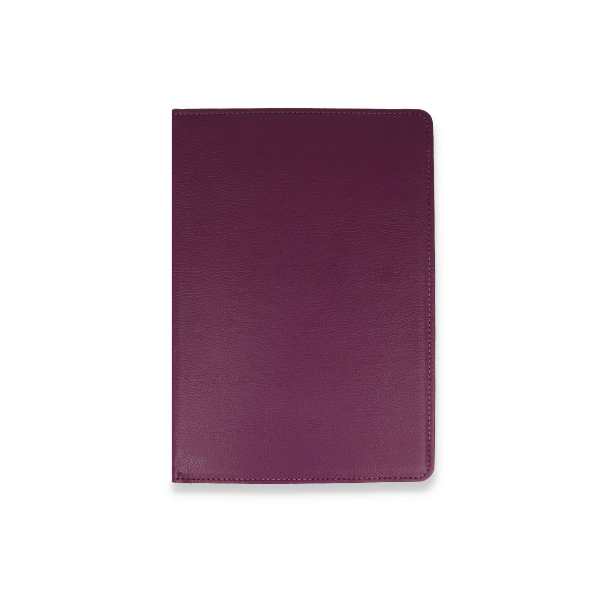 Kapalı, koyu mor deri defter beyaz zeminde duruyor.