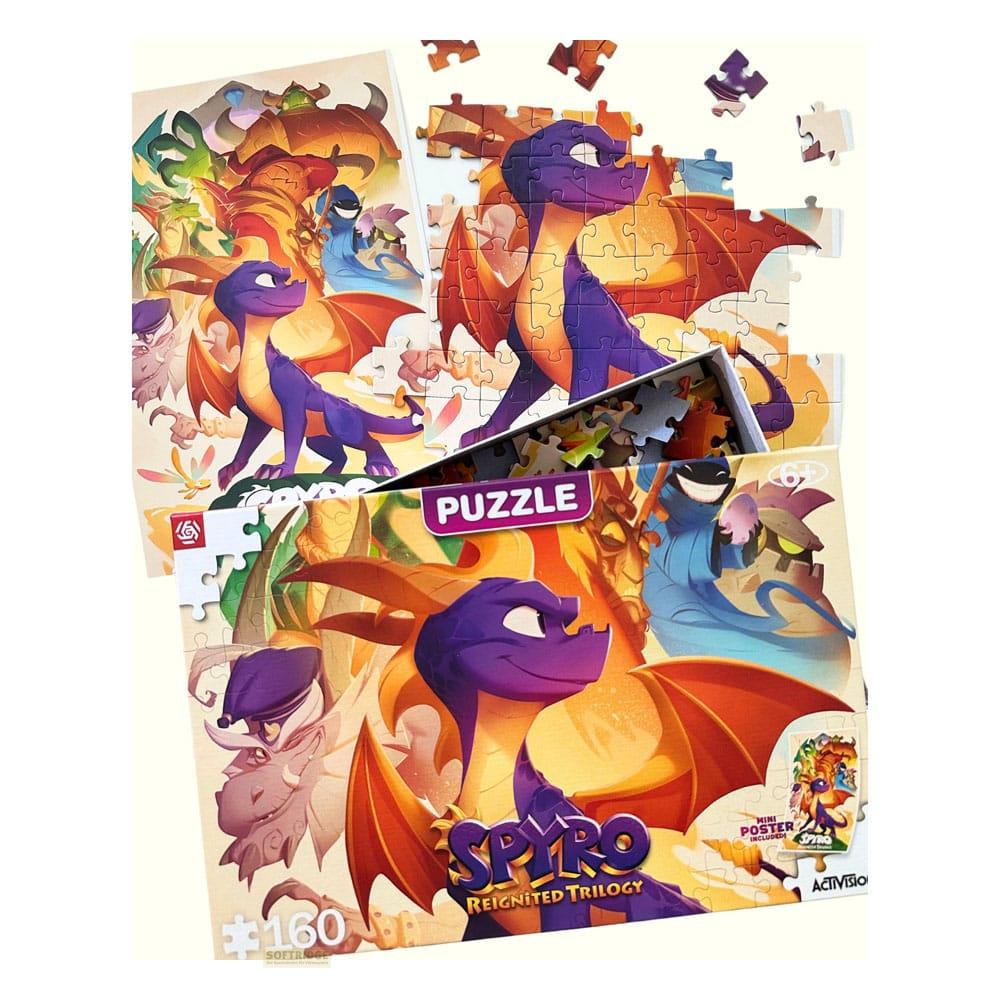 Caja de puzzle Spyro Reignited Trilogy con arte de dragón morado. Piezas sueltas esparcidas.