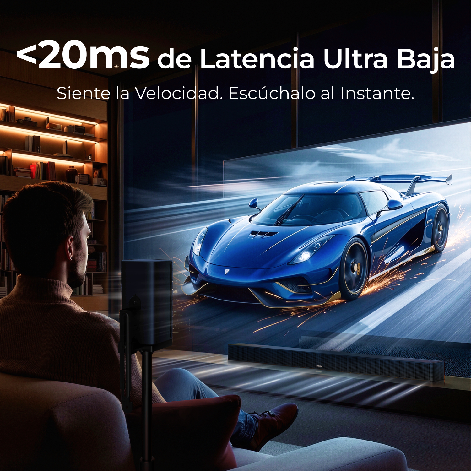 Hombre ve un coche deportivo azul en pantalla, con altavoces.