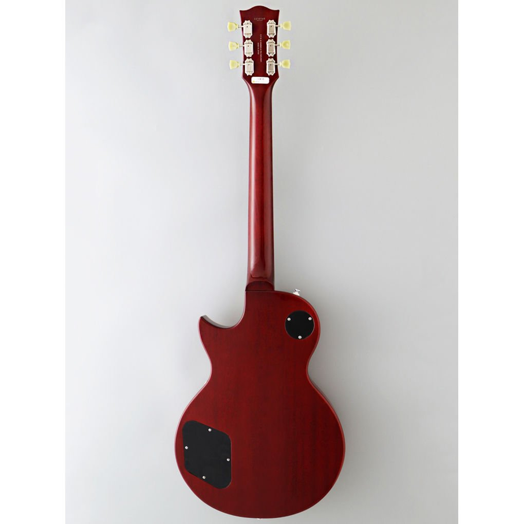 Altı akort burgusu ve siyah kapaklı kırmızı elektro gitarın arka görünümü.