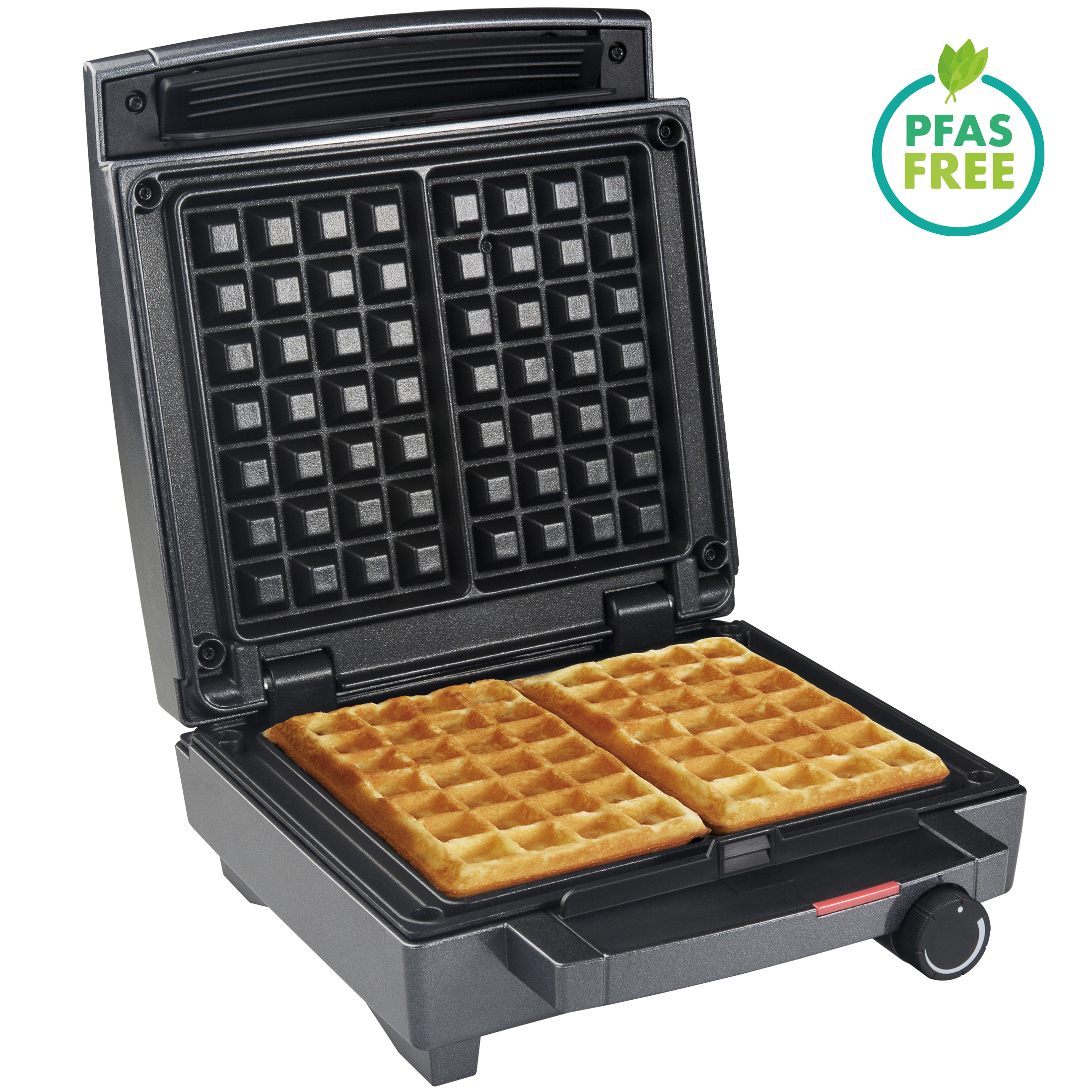 An open waffle maker with two golden waffles and a "PFAS FREE" seal.