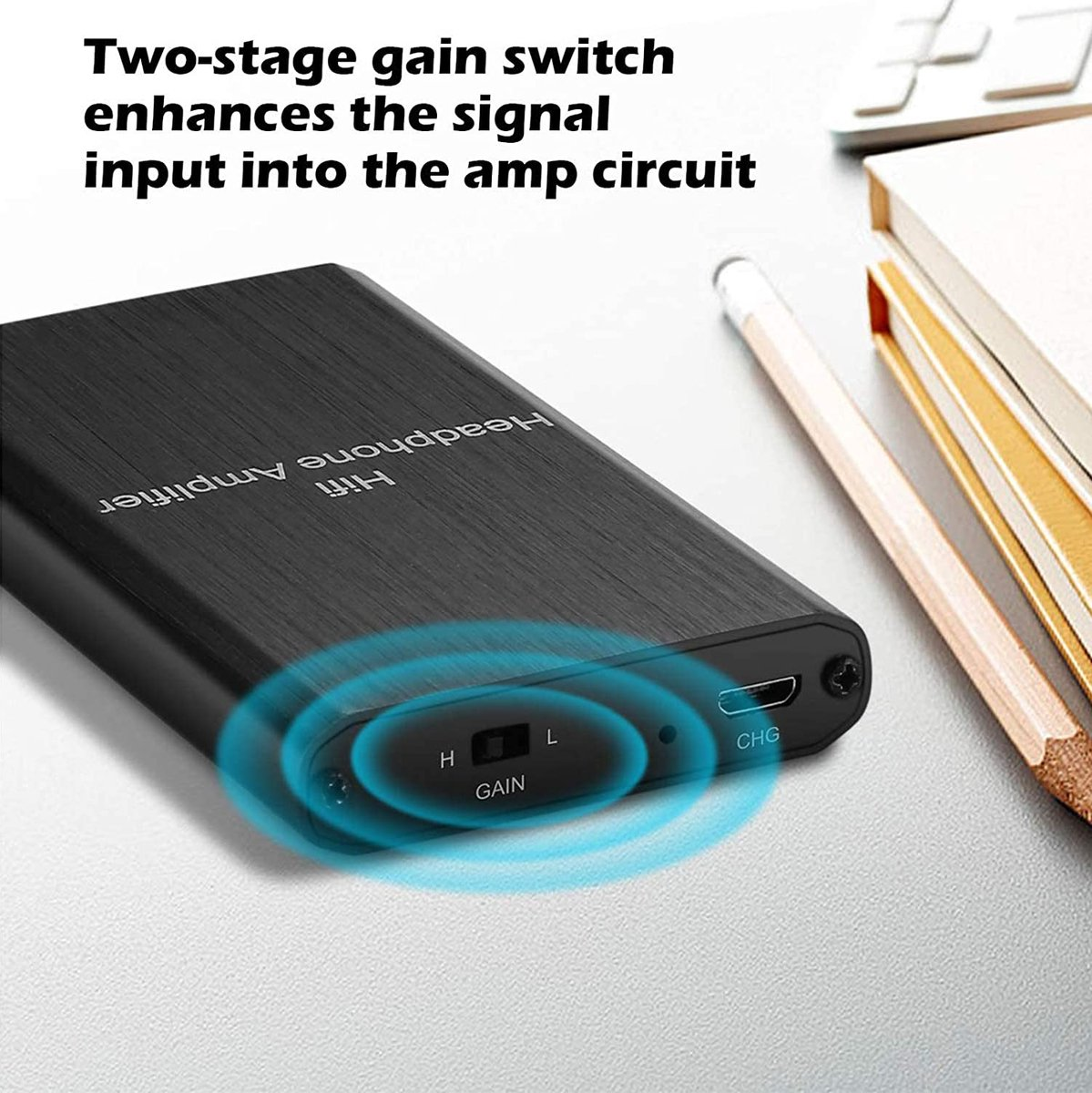Black headphone amplifier with H/L gain switch and CHG port.