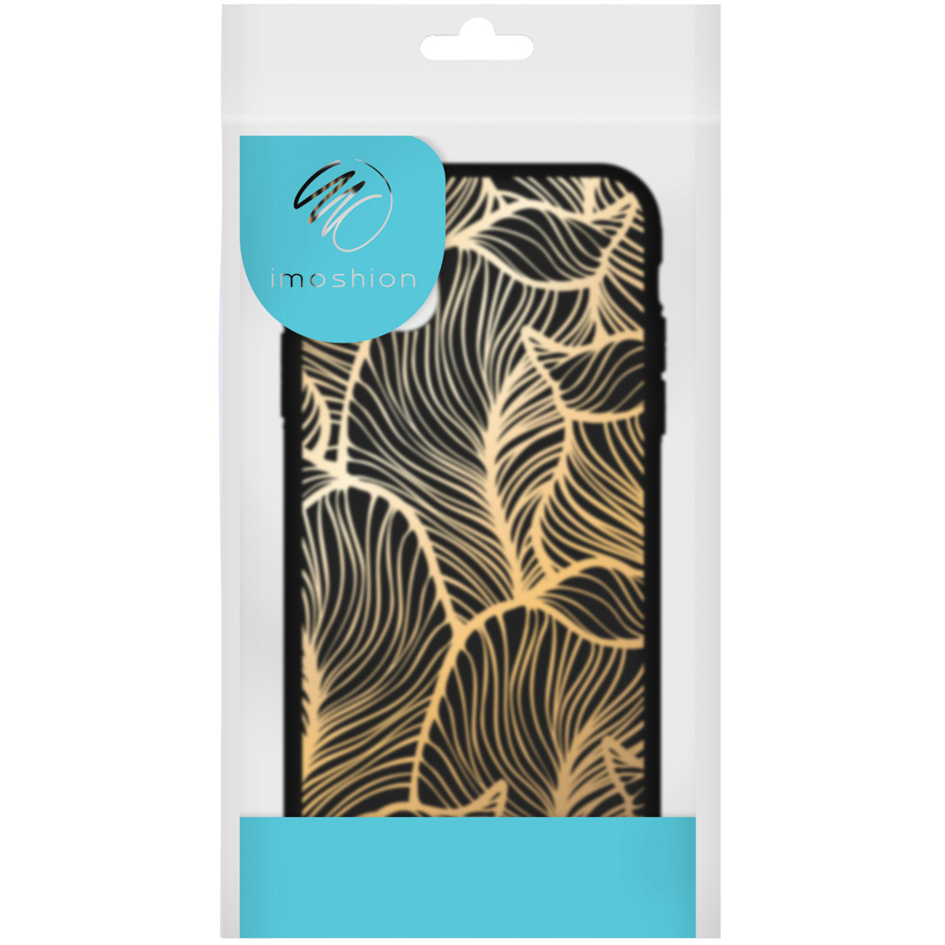 Coque de téléphone noire avec motif de feuilles dorées dans son emballage.