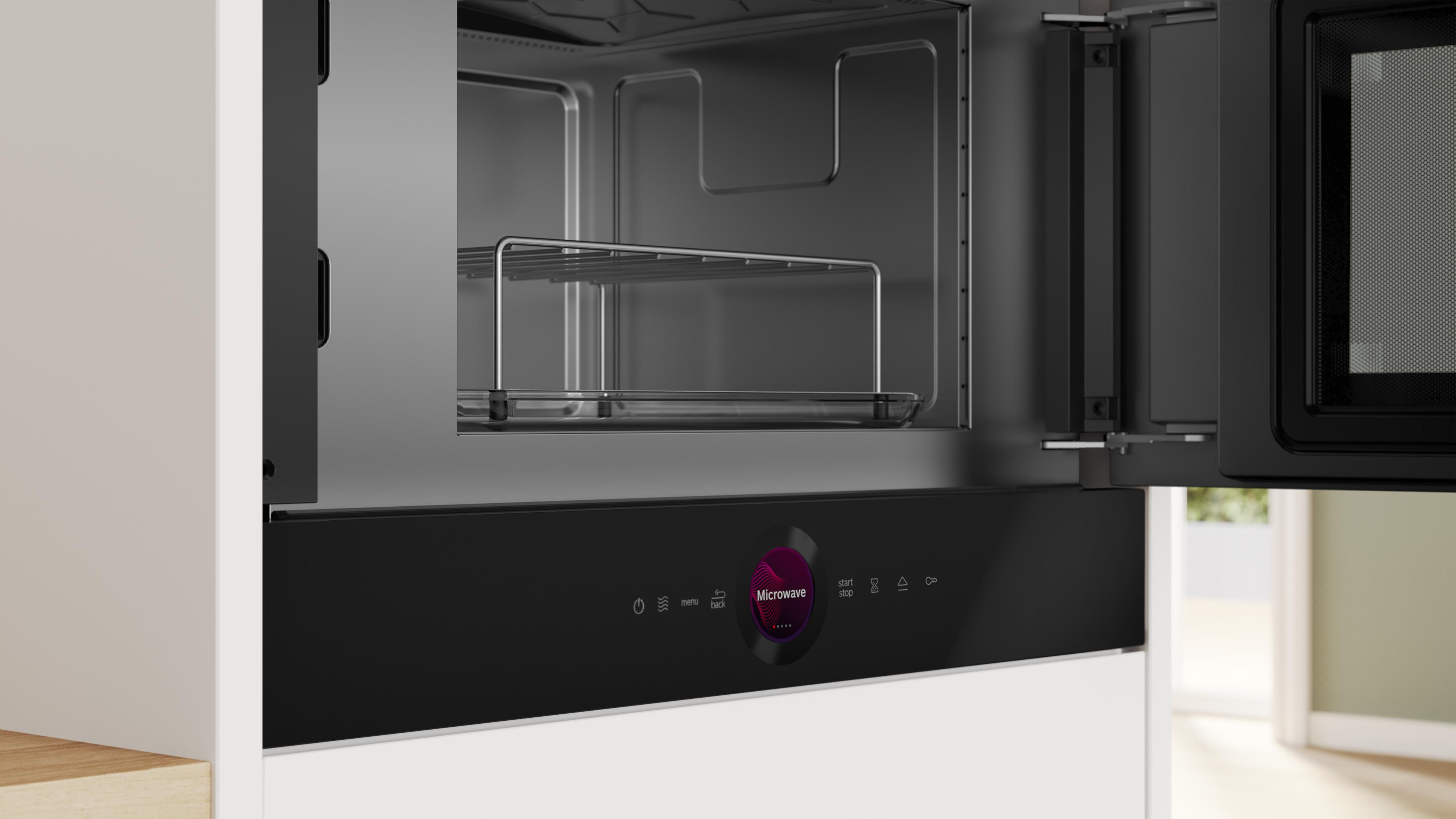 Nowoczesna kuchenka mikrofalowa do zabudowy z otwartą komorą i panelem dotykowym.
