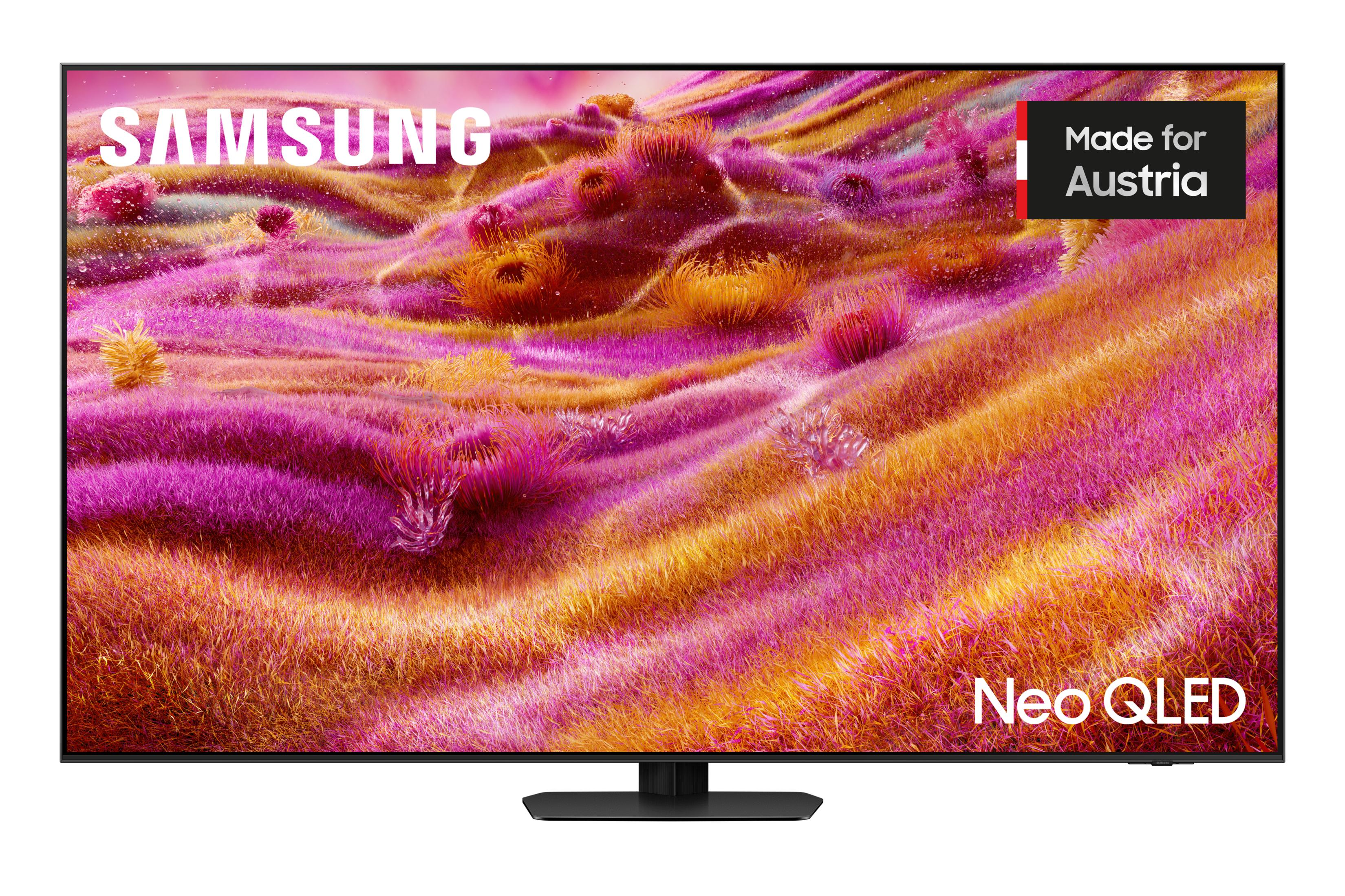 TV Samsung Neo QLED avec visuels abstraits rose et orange ressemblant à de l'herbe. Made for Austria.