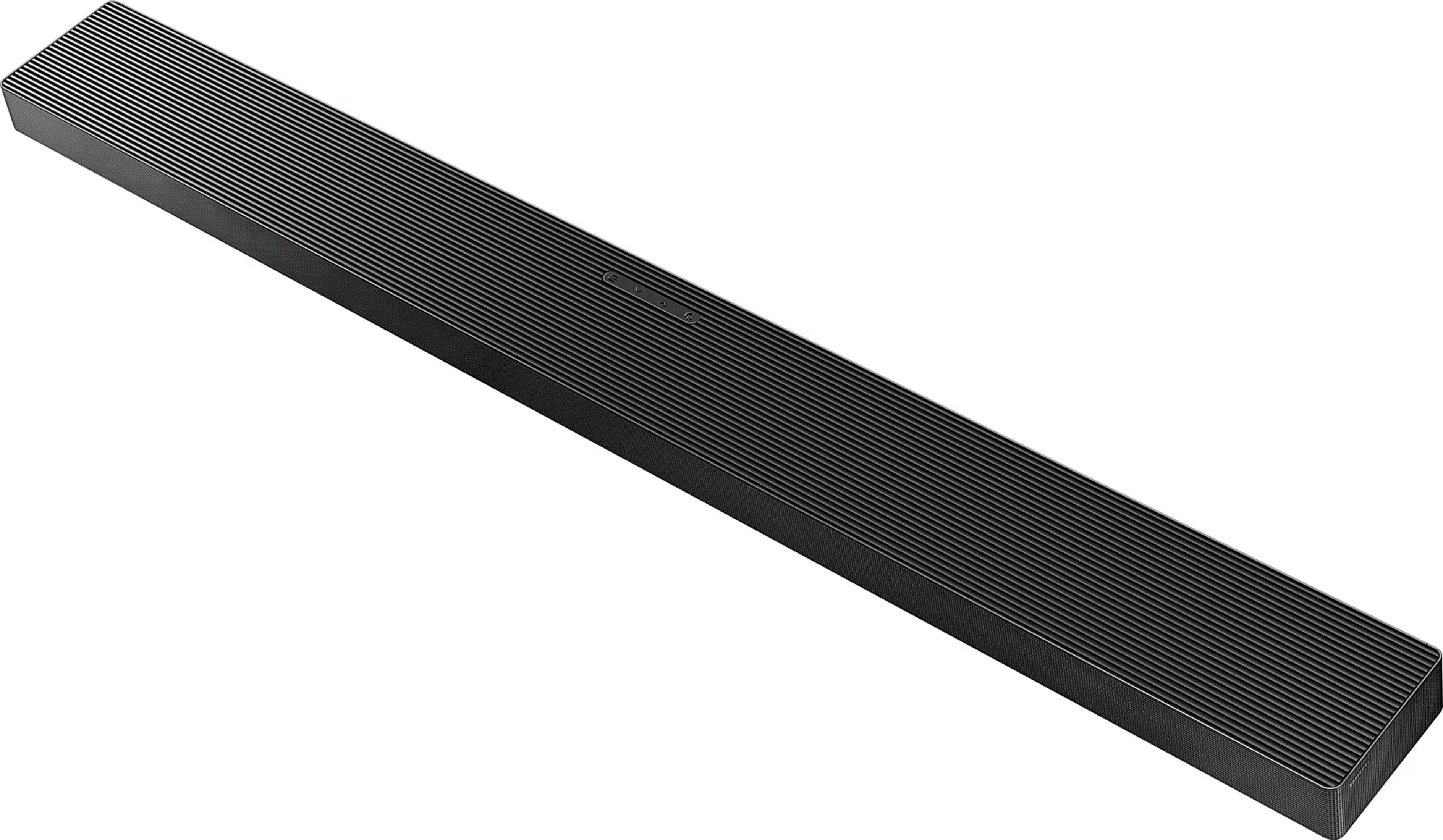 Barre de son noire avec surface supérieure nervurée et boutons.