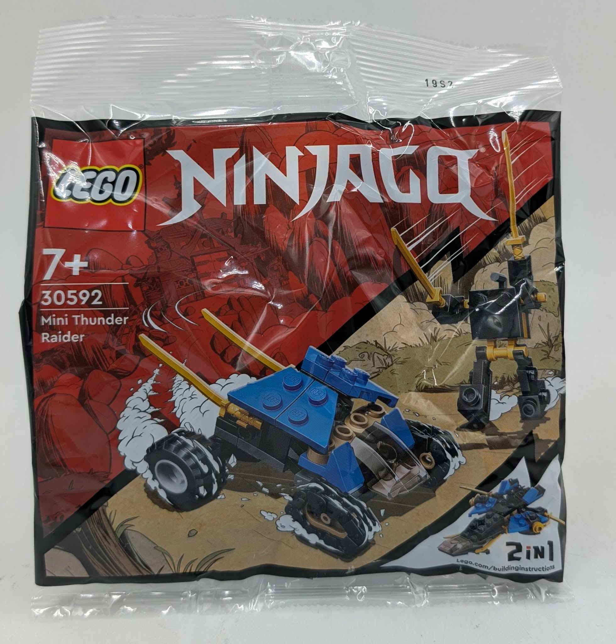 Emballage jouet LEGO Ninjago Mini Thunder Raider 30592 montrant véhicule et robot.