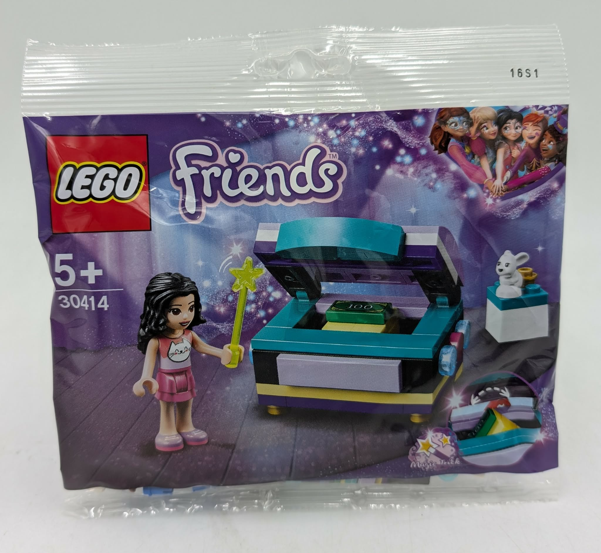 Pack LEGO Friends avec mini-poupée, baguette, coffre, lapin et argent.