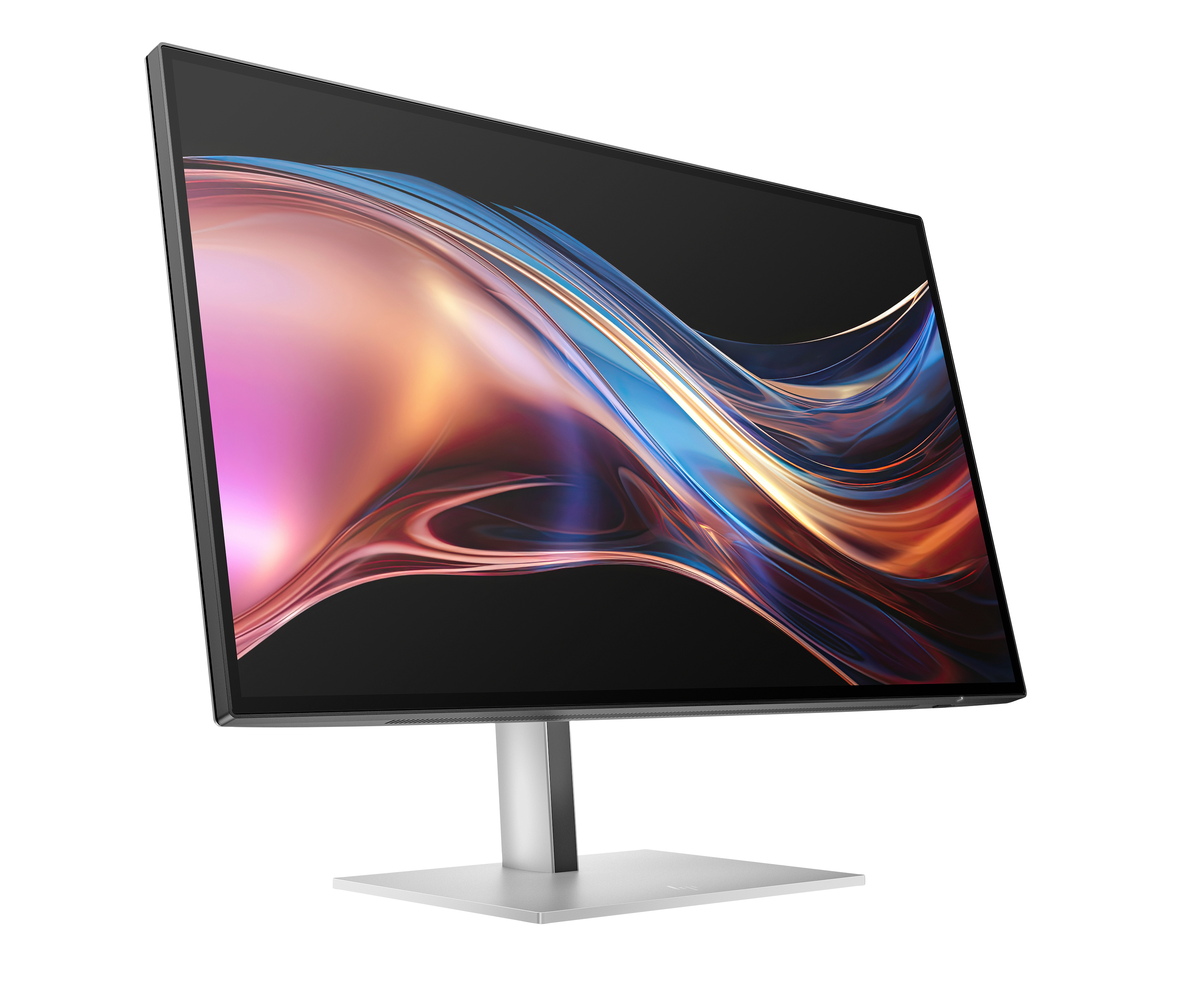 Un monitor moderno con un fondo abstracto y colorido sobre un soporte plateado.