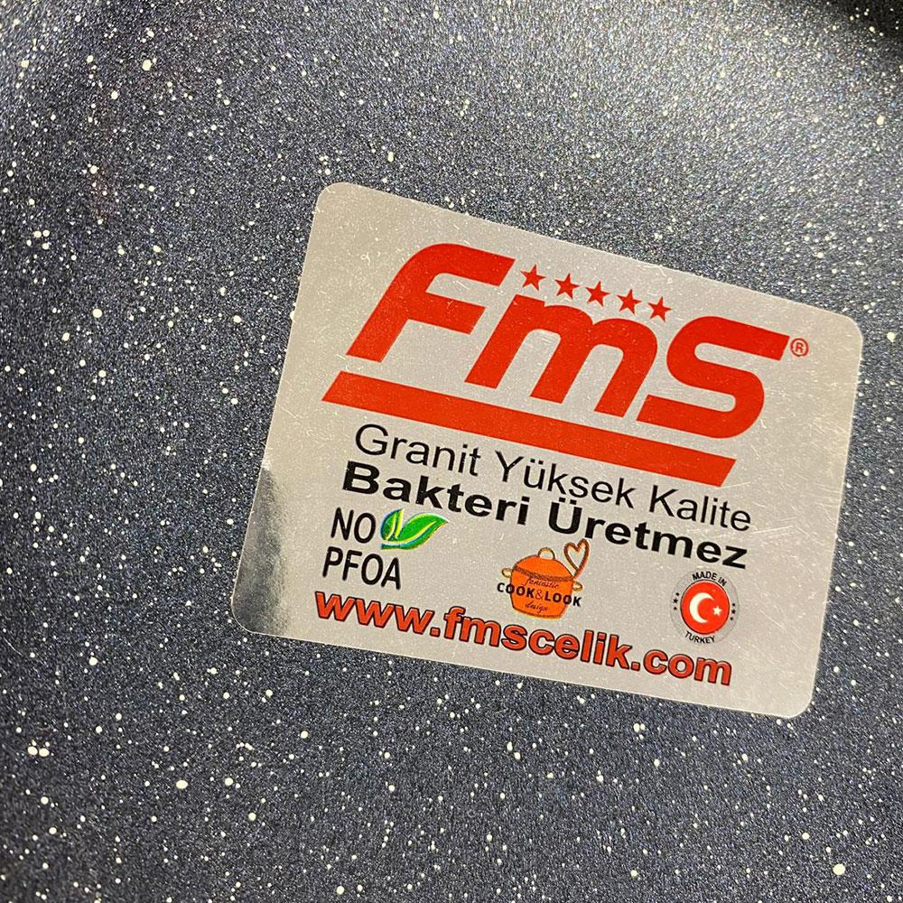 FMS logosu, üzerinde 'Granit Yüksek Kalite, Bakteri Üretmez', 'PFOA YOK', 'Made in Turkey' yazılı koyu benekli zeminde.