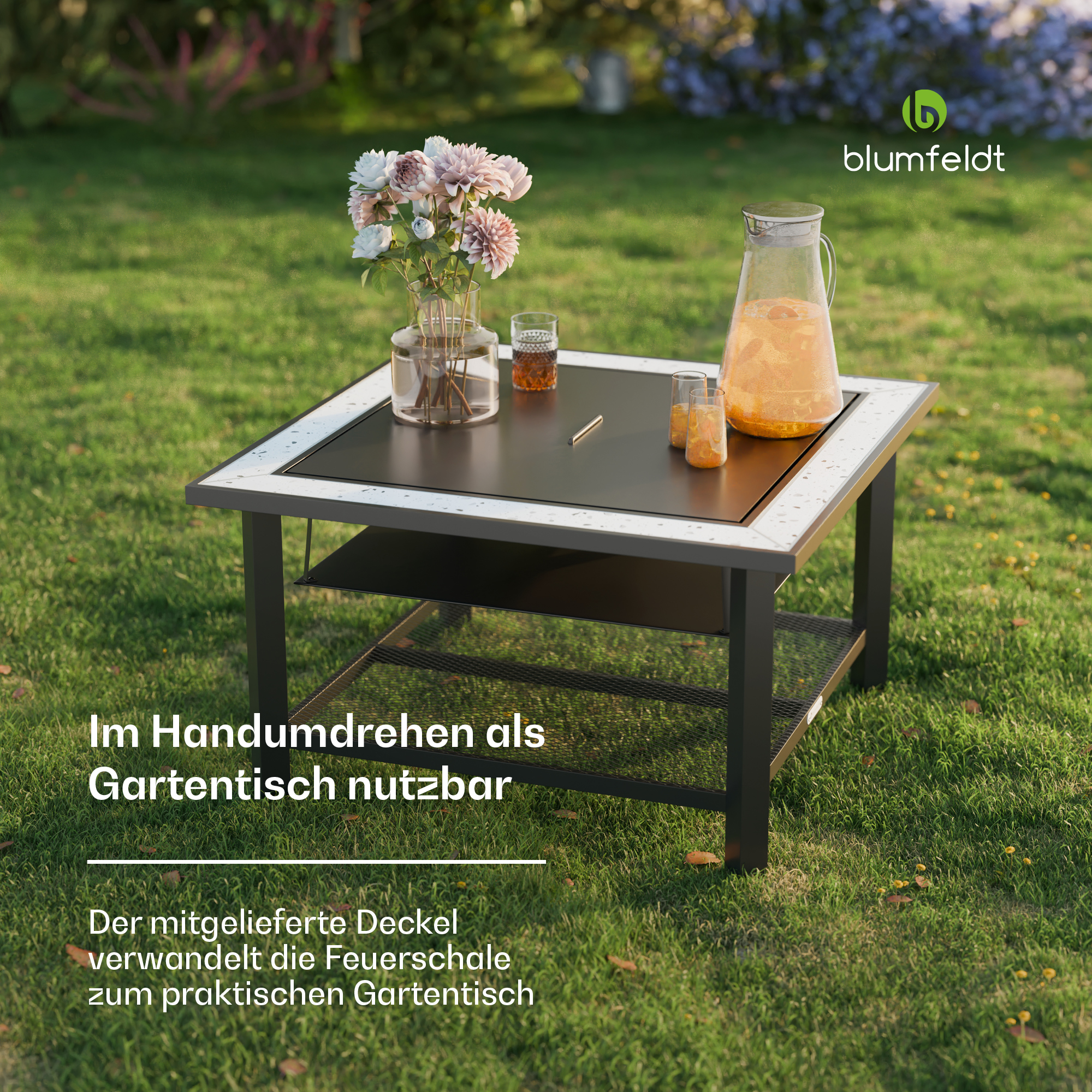 Ein Gartentisch mit Blumen, Getränken und einem Logo auf einem Rasen.