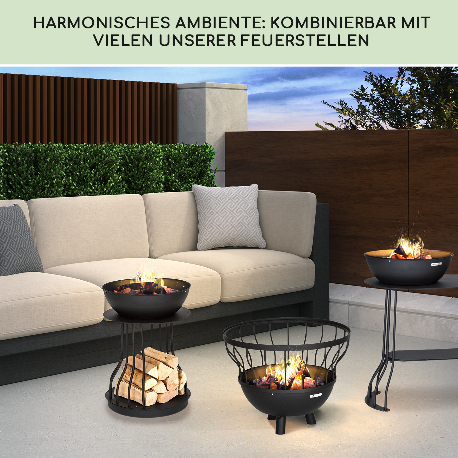 Drei Feuerstellen auf einer Terrasse mit Sofa, Holz und Flammen.