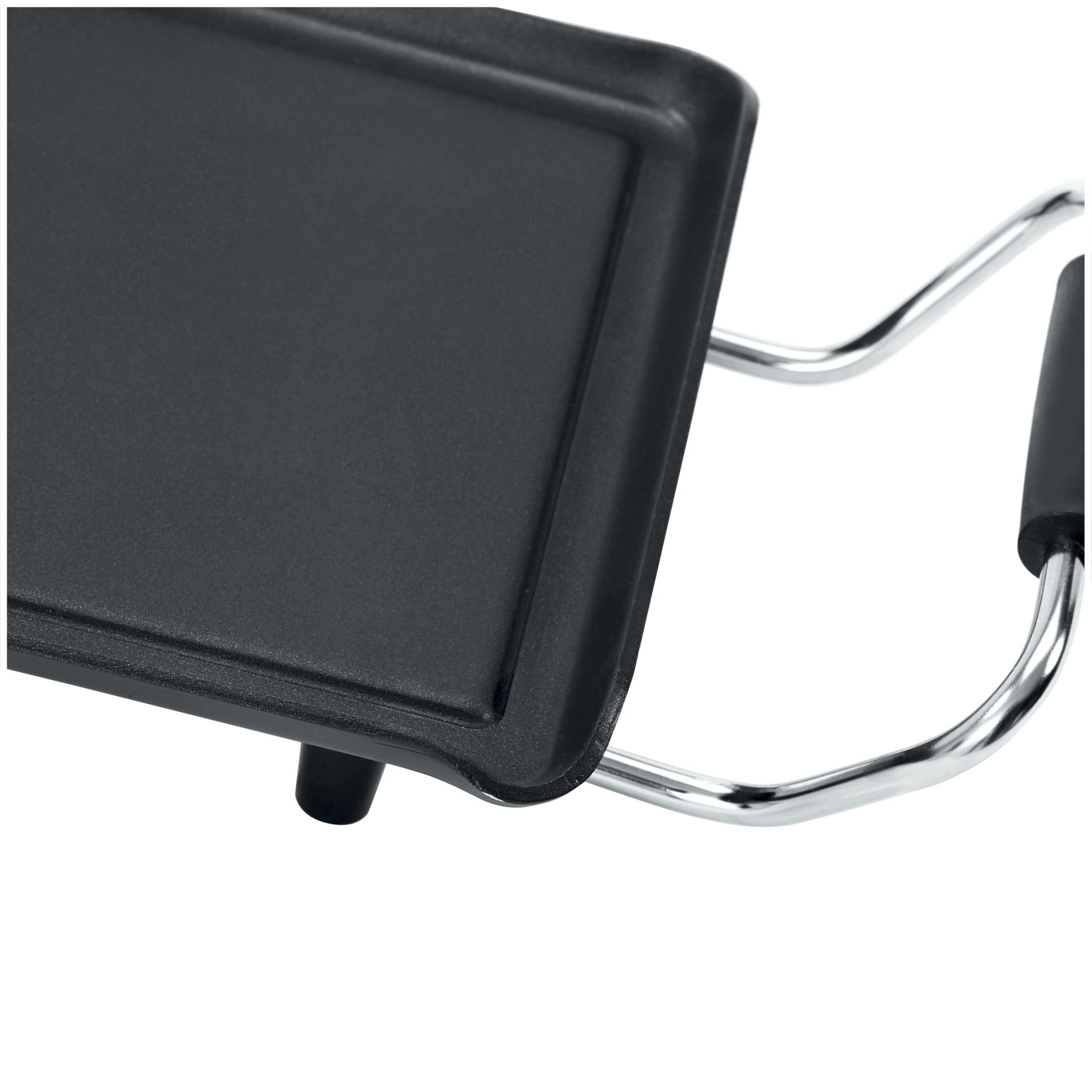 A close-up of a black griddle plate with polished metal handles.